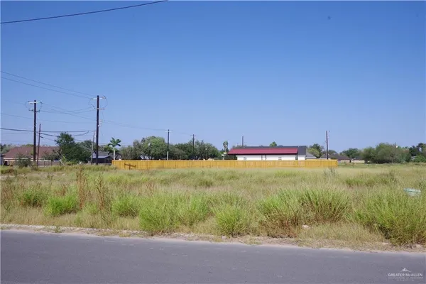 a view of a lake with a big yard