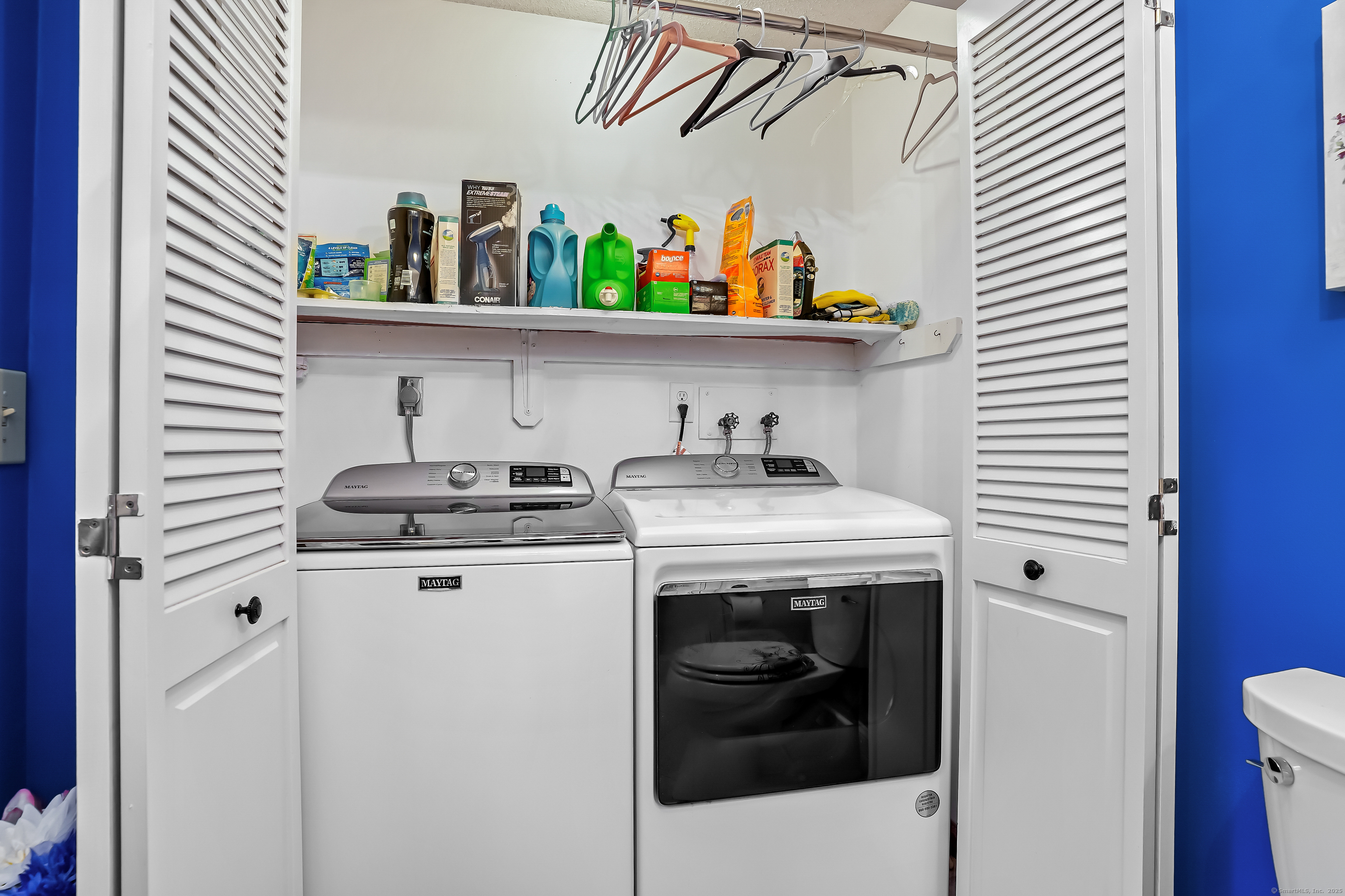 4 Autumn Ridge Road New Fairfield, CT 06812 - Photo 17 of 40 a utility room with dryer and washer