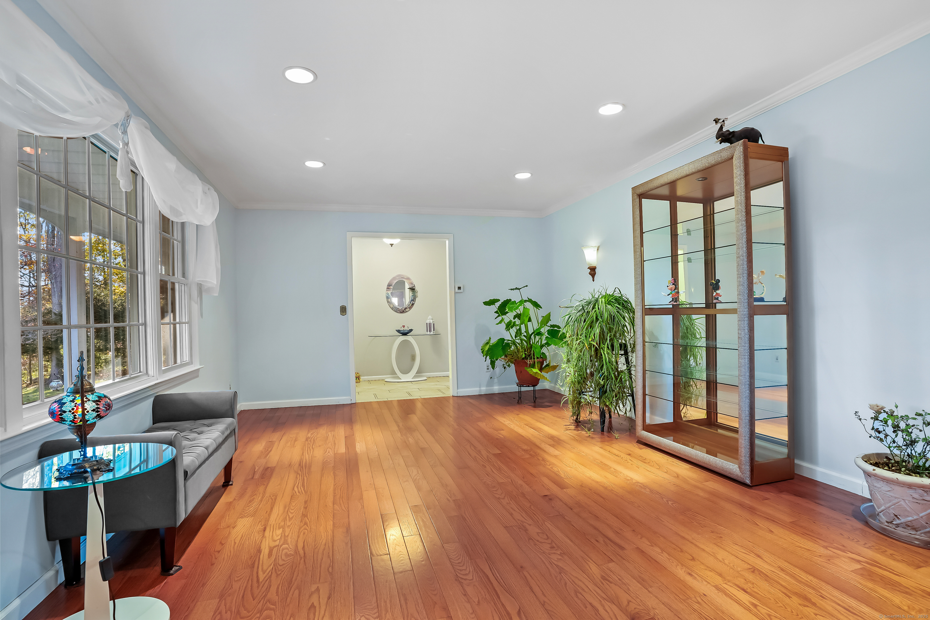 4 Autumn Ridge Road New Fairfield, CT 06812 - Photo 18 of 40 a living room with furniture and wooden floor