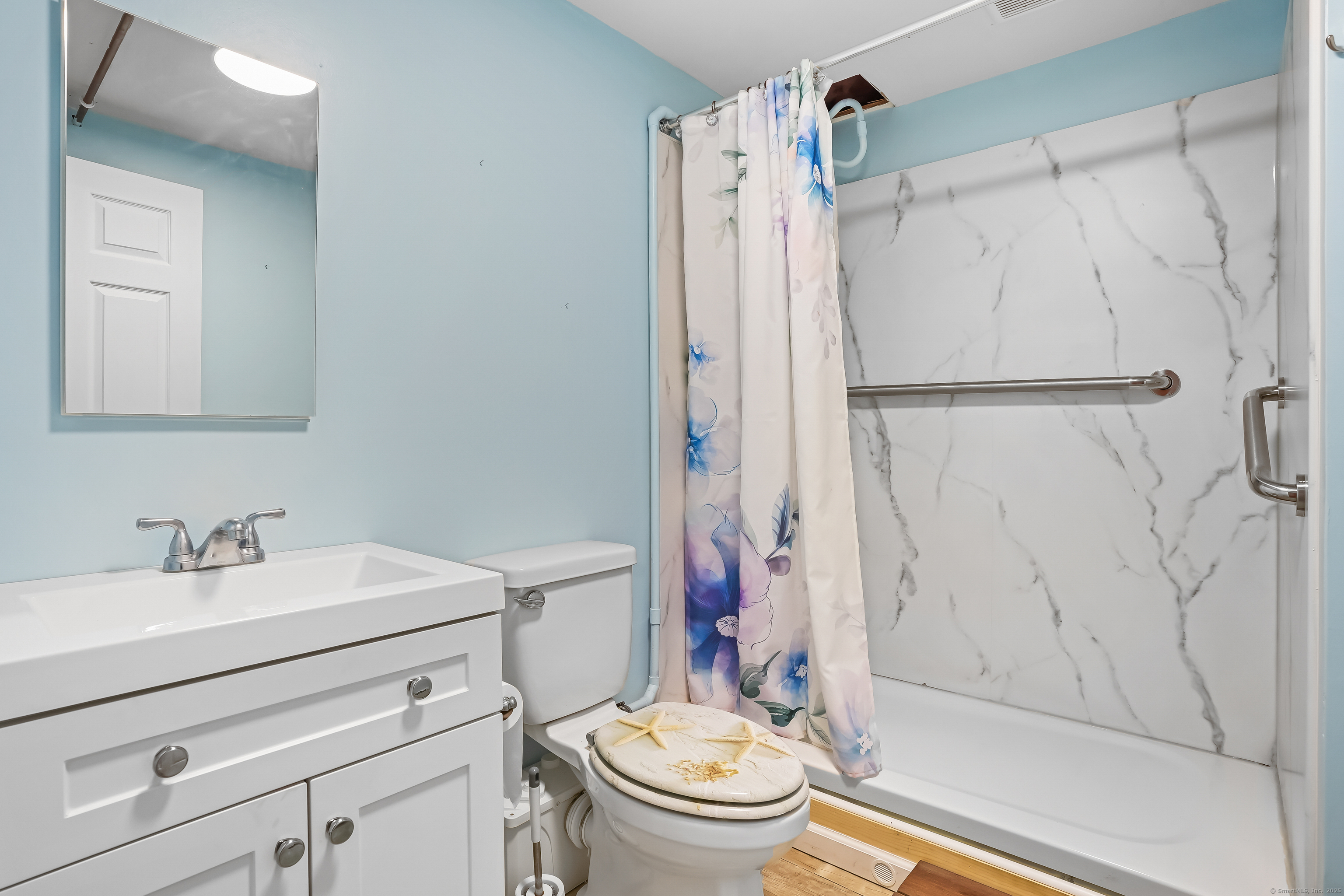 4 Autumn Ridge Road New Fairfield, CT 06812 - Photo 30 of 40 a bathroom with a sink toilet and shower