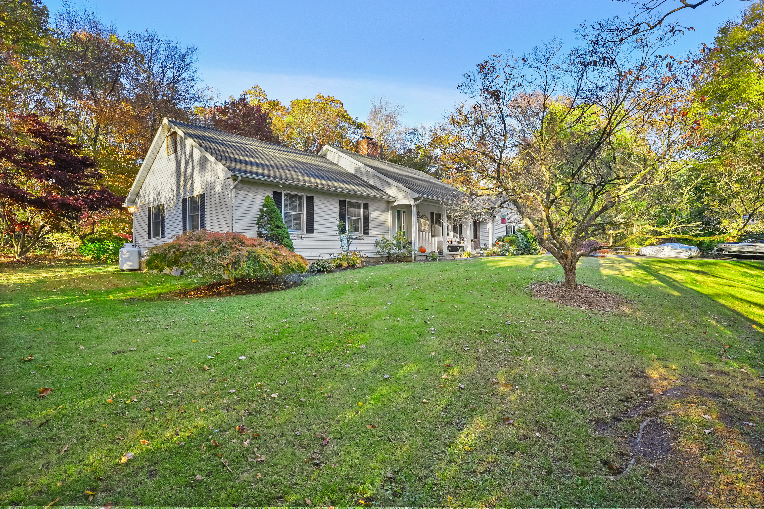 4 Autumn Ridge Road New Fairfield, CT 06812 - Photo 3 of 40 a front view of house with yard and green space