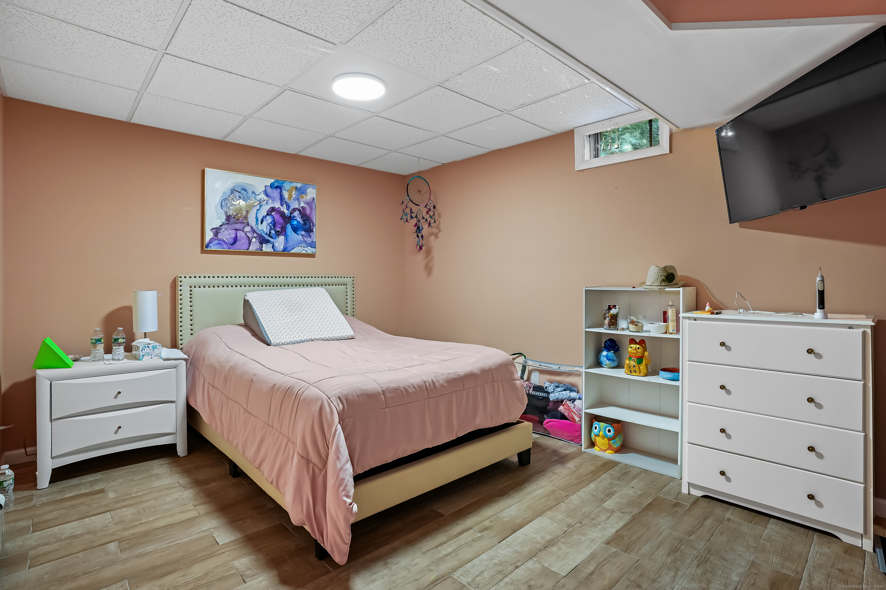 4 Autumn Ridge Road New Fairfield, CT 06812 - Photo 31 of 40 a bedroom with a bed and a television