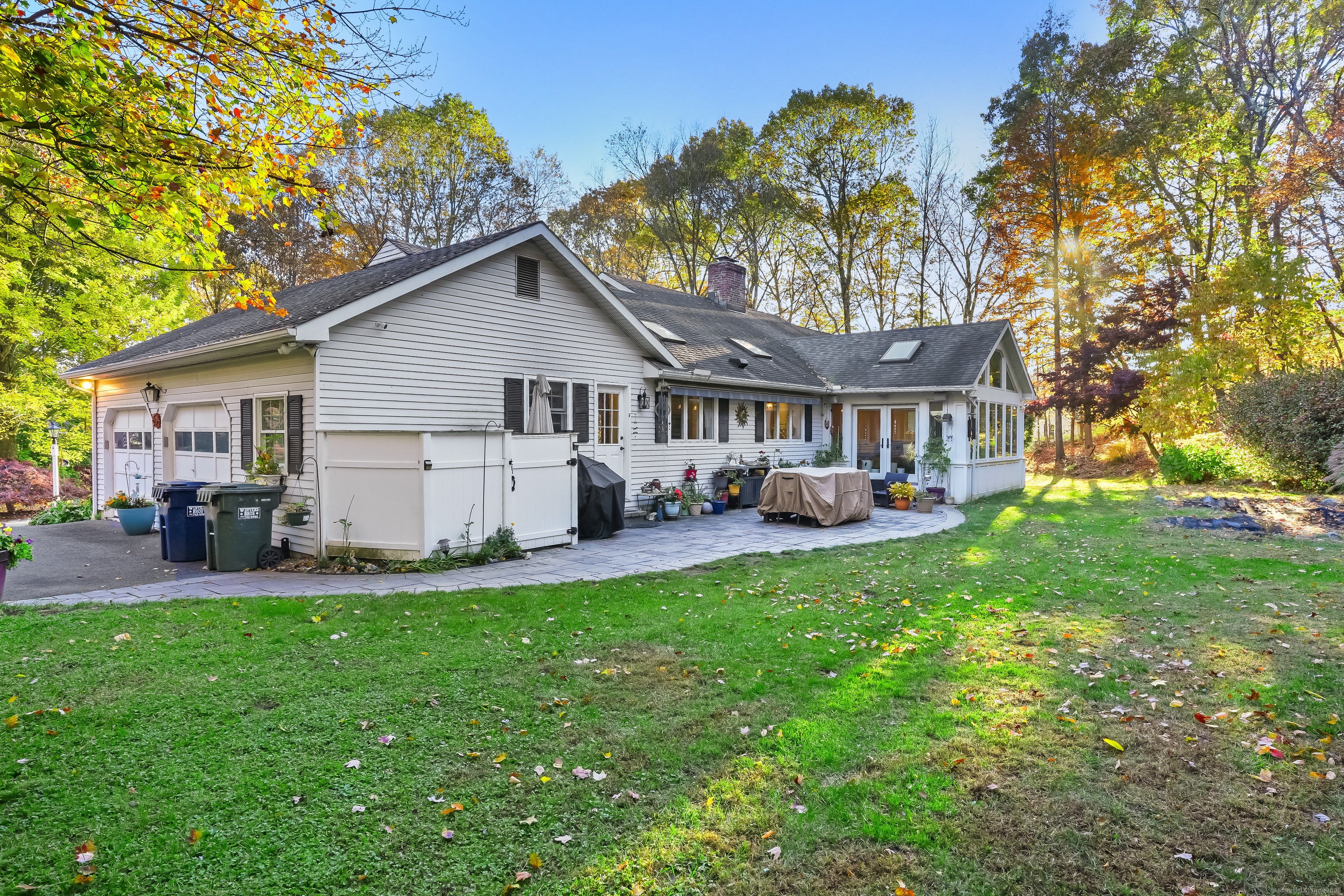 4 Autumn Ridge Road New Fairfield, CT 06812 - Photo 34 of 40 a view of a house with a yard and sitting area