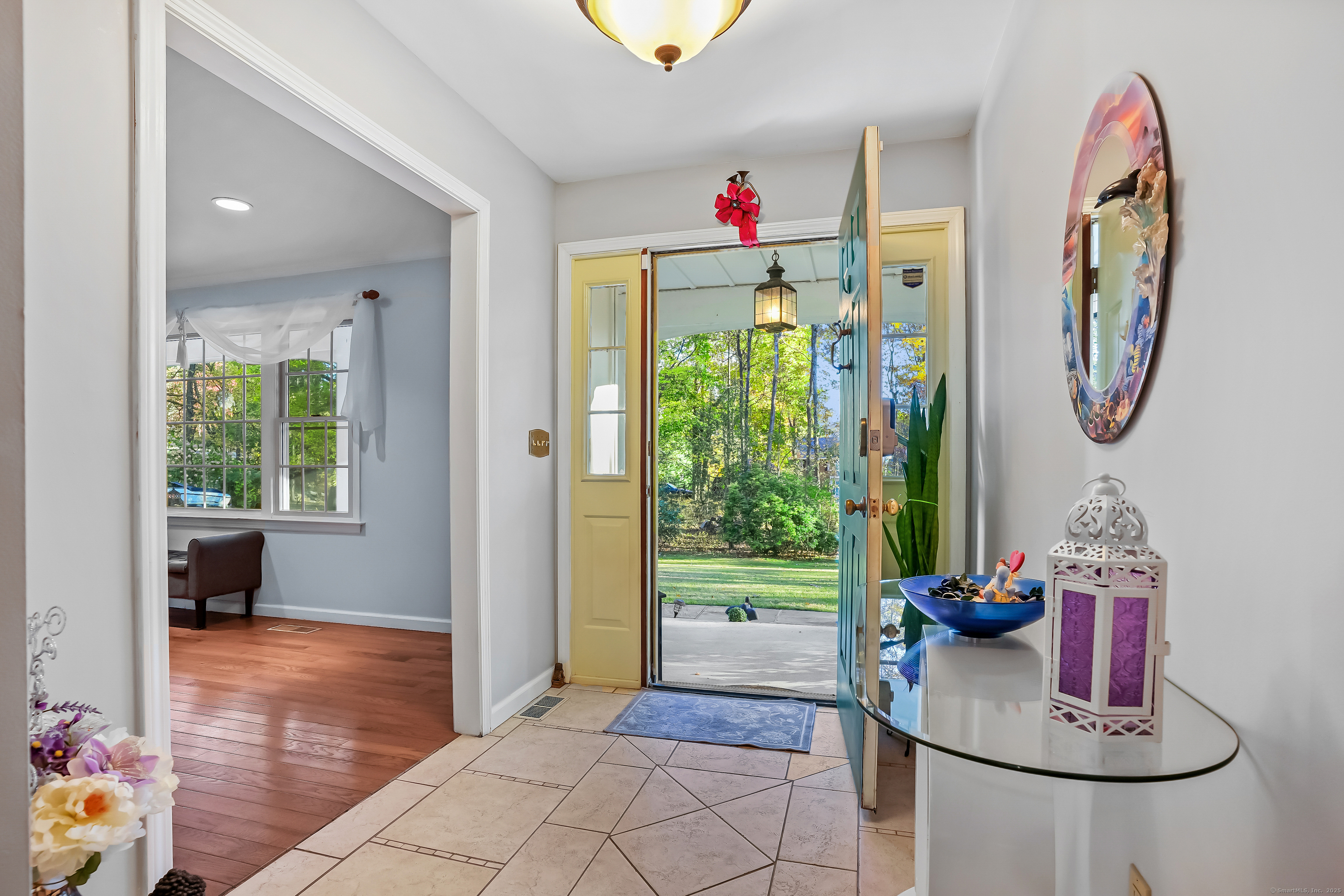 4 Autumn Ridge Road New Fairfield, CT 06812 - Photo 5 of 40 a view of entryway with furniture and garden view