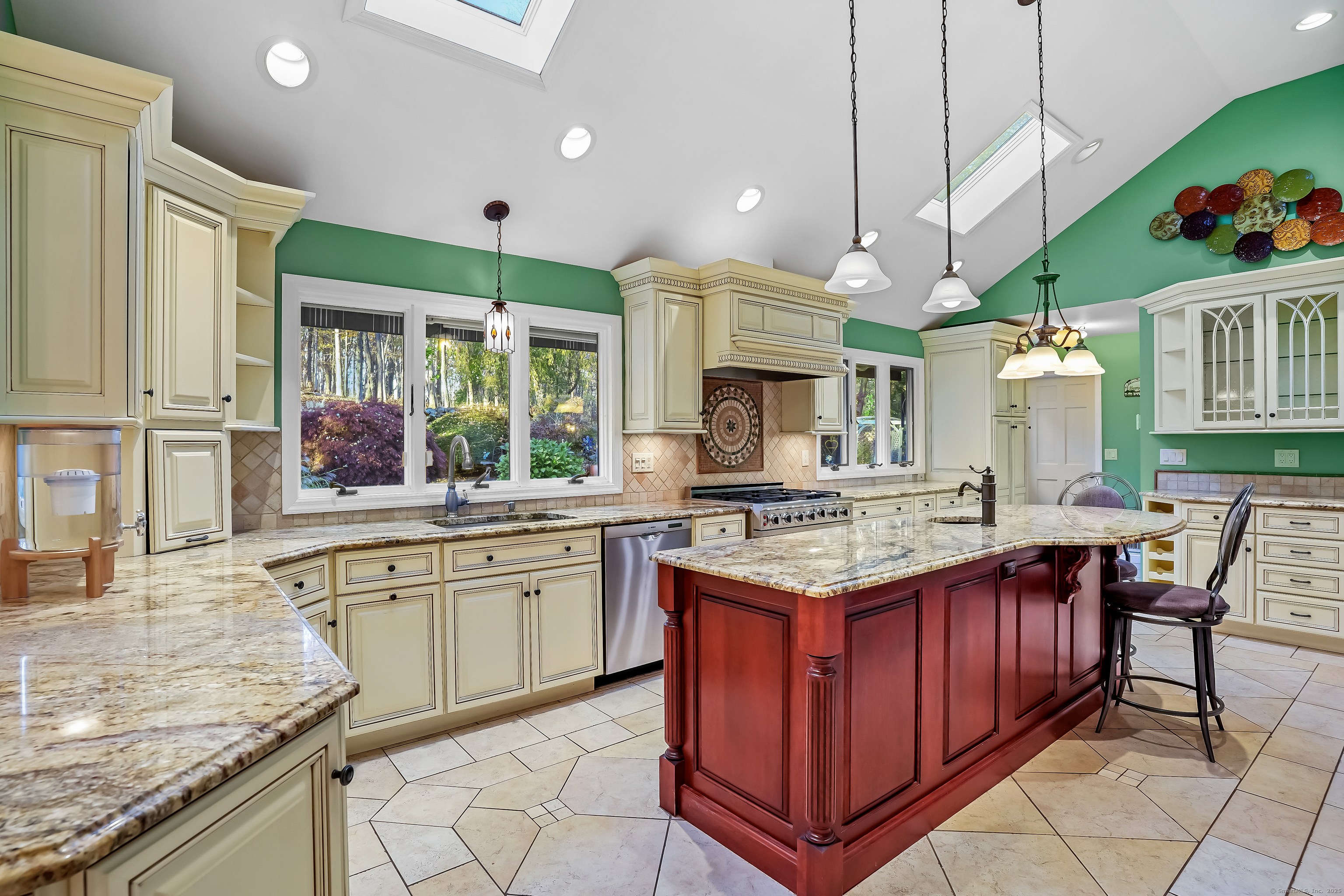 4 Autumn Ridge Road New Fairfield, CT 06812 - Photo 6 of 40 a kitchen with a stove sink and cabinets