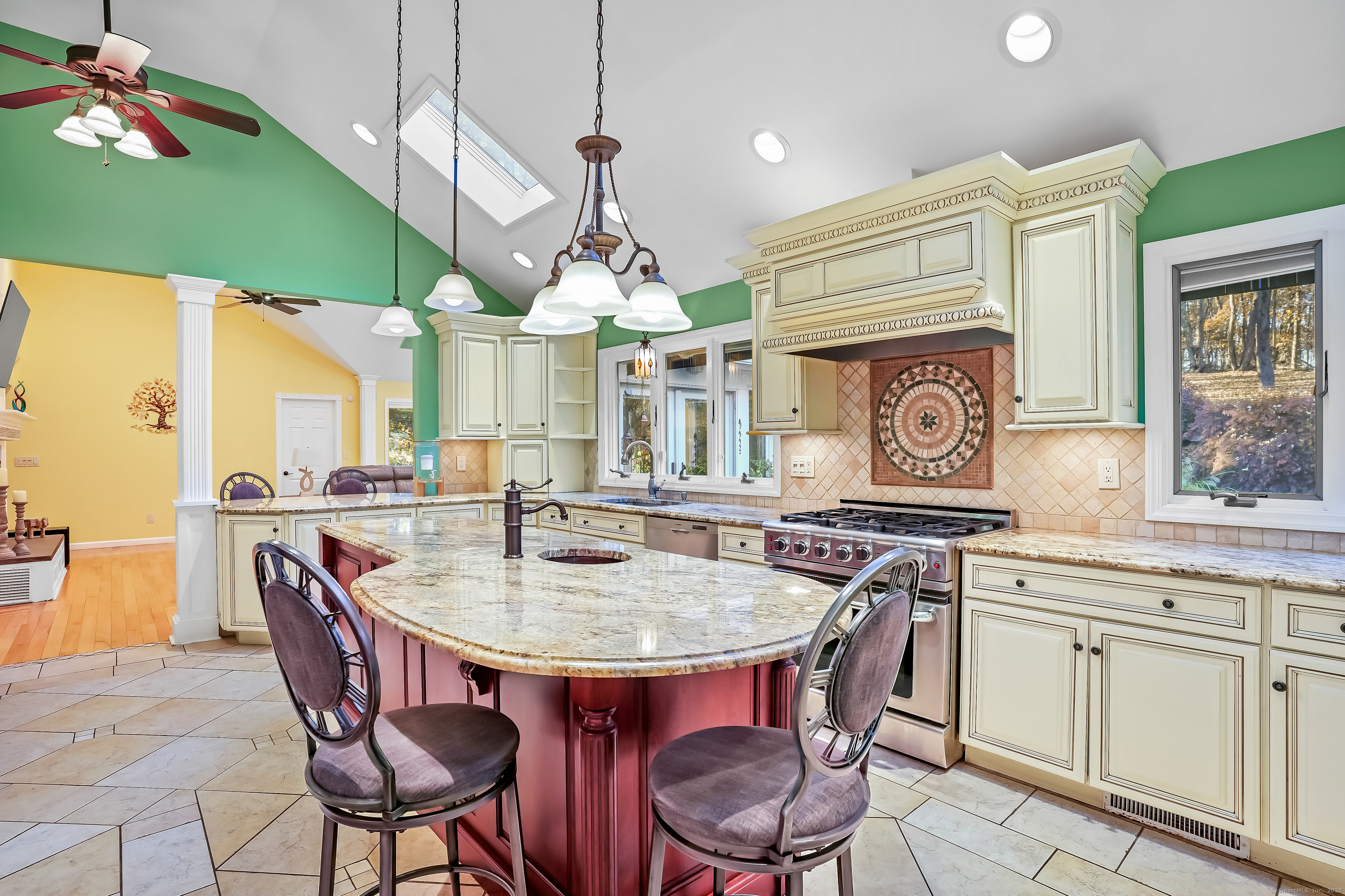4 Autumn Ridge Road New Fairfield, CT 06812 - Photo 7 of 40 a kitchen with a dining table and chairs