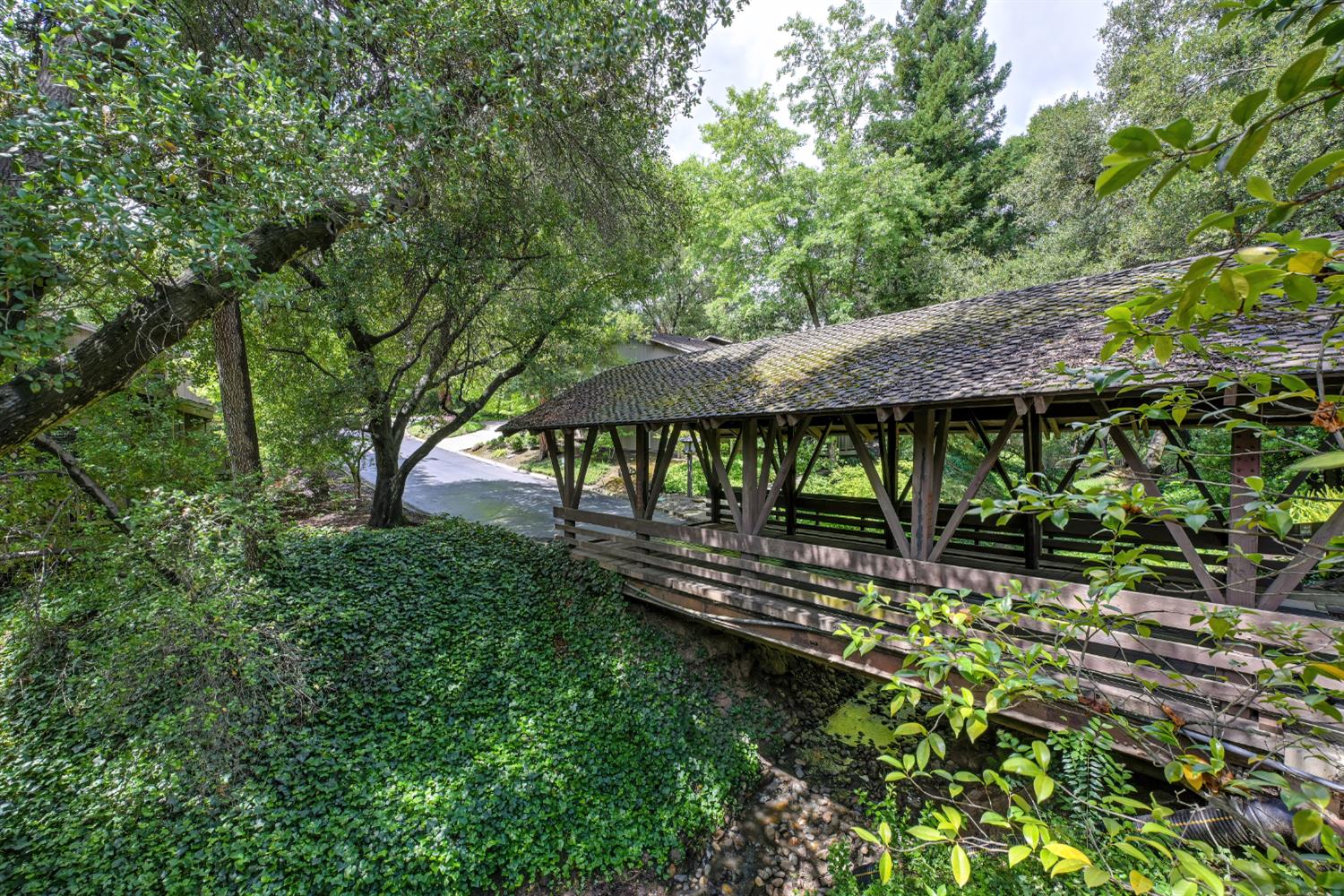 18 Covered Bridge Road Carmichael, CA 95608 - Photo 34 of 81 a view of a house with backyard and sitting area