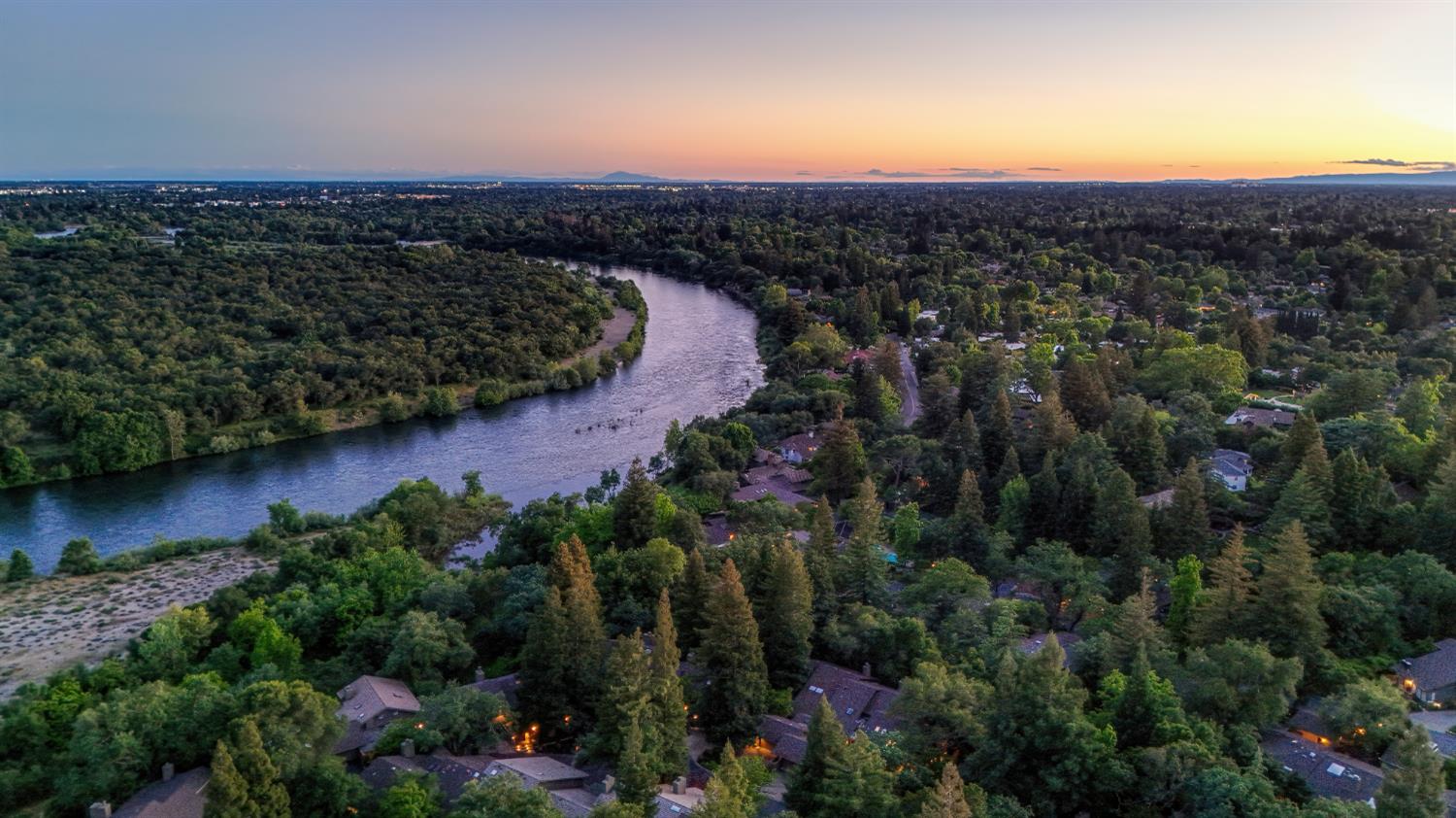 18 Covered Bridge Road Carmichael, CA 95608 - Photo 79 of 81 a view of a city with sunset view