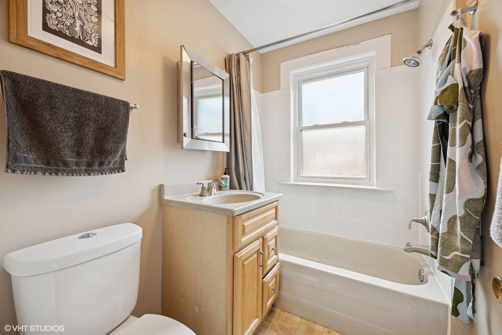 938 Washington Boulevard, Unit 3W Oak Park, IL 60302 - Photo 12 of 16 a bathroom with a granite countertop toilet sink and mirror