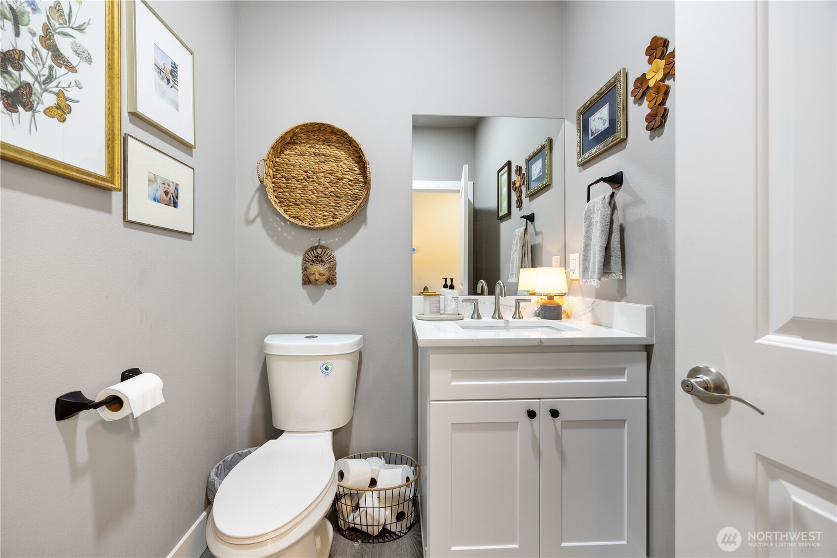 9968 Griffith Place Entiat, WA 98822 - Photo 7 of 38 a bathroom with a toilet a sink and a mirror