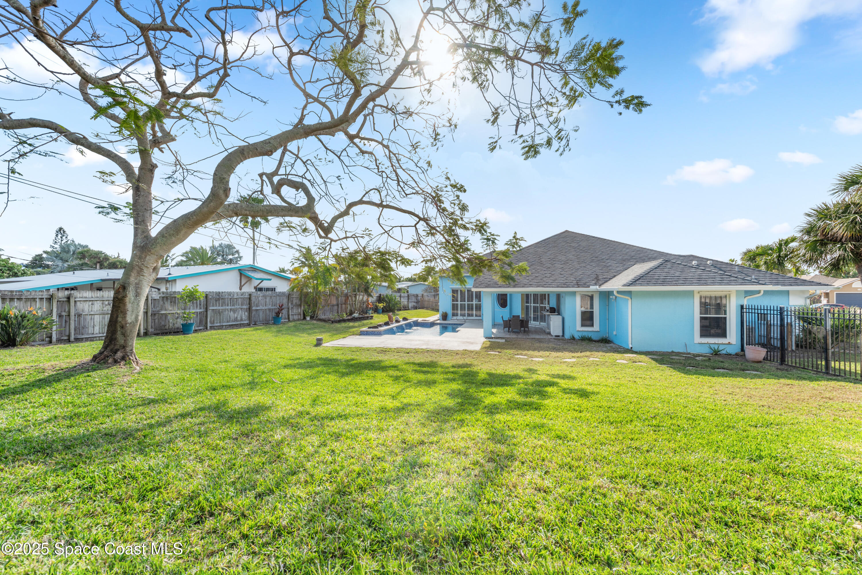 452 Veracruz Boulevard Indialantic, FL 32903 - Photo 17 of 42 Royal Poinciana is EPIC in Bloom!