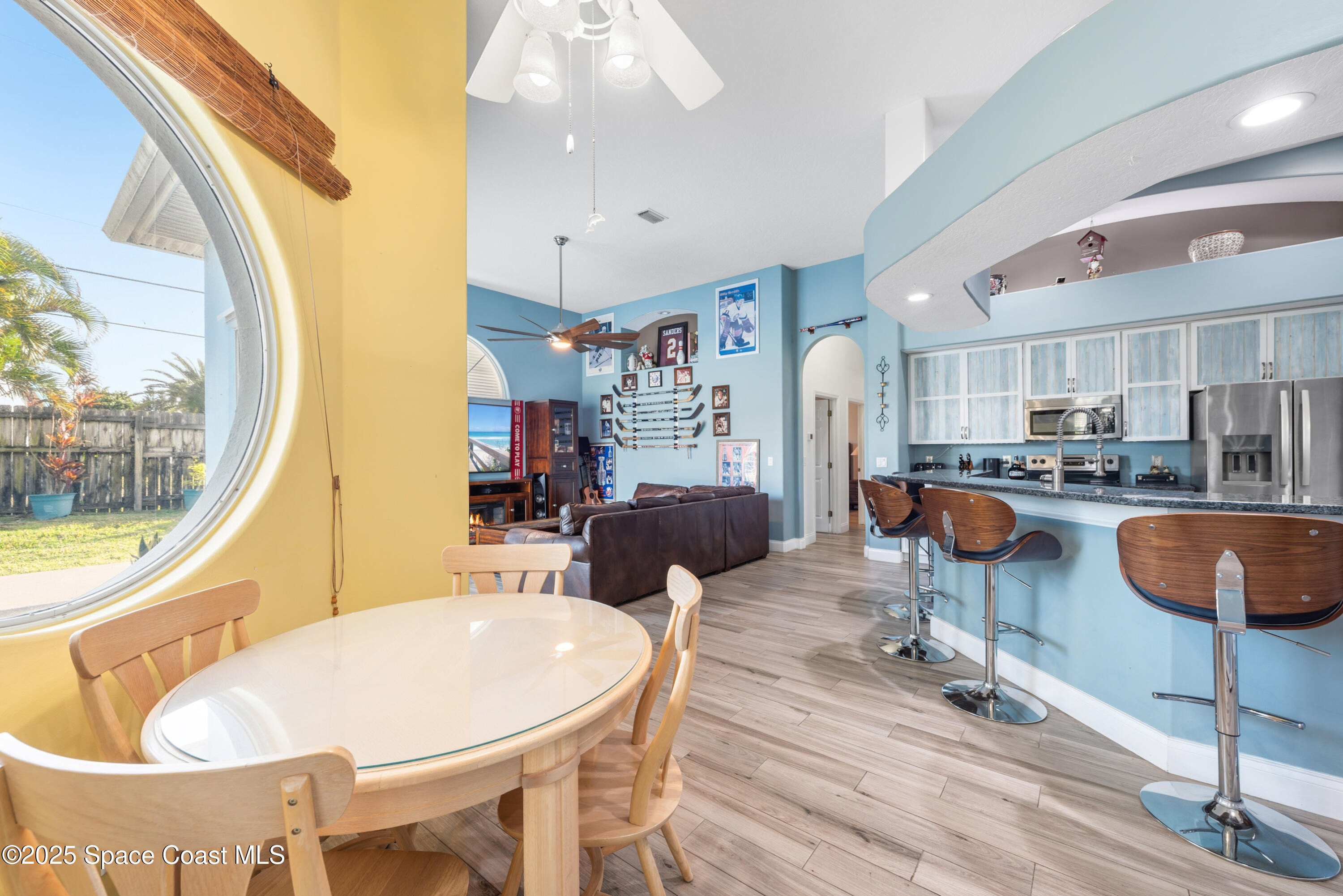452 Veracruz Boulevard Indialantic, FL 32903 - Photo 19 of 42 a very nice looking dining room with a table and chairs