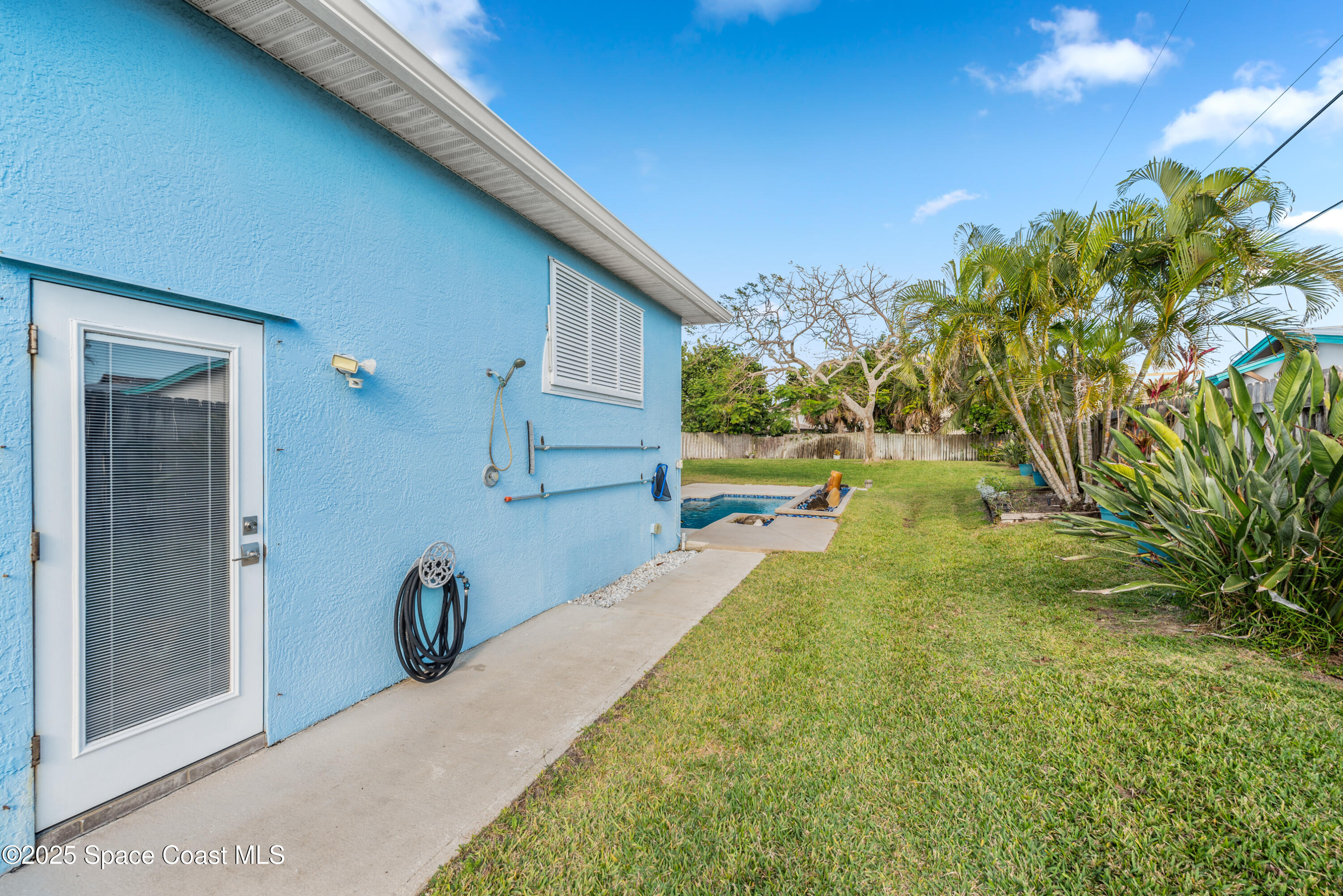452 Veracruz Boulevard Indialantic, FL 32903 - Photo 23 of 42 a view of a backyard of the house