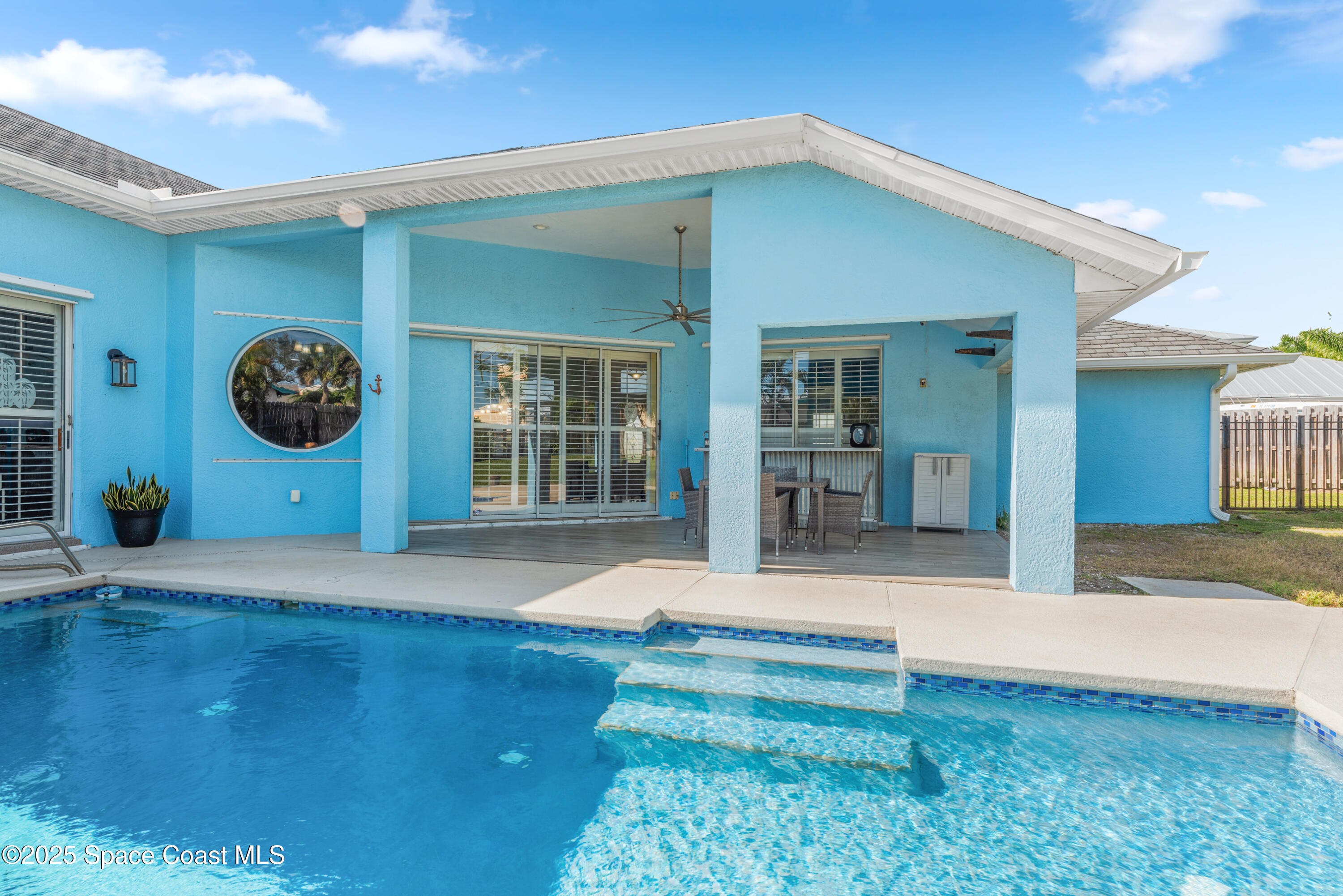 452 Veracruz Boulevard Indialantic, FL 32903 - Photo 27 of 42 a view of a house with a backyard