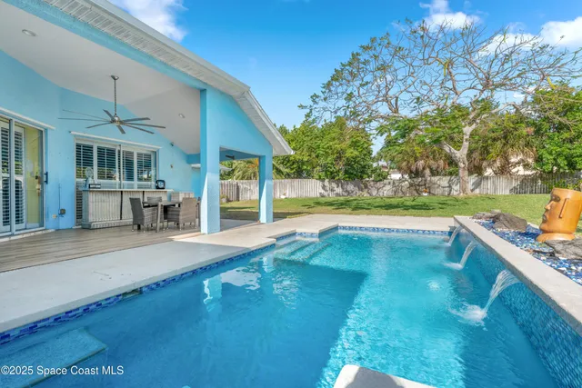 a view of a house with a swimming pool