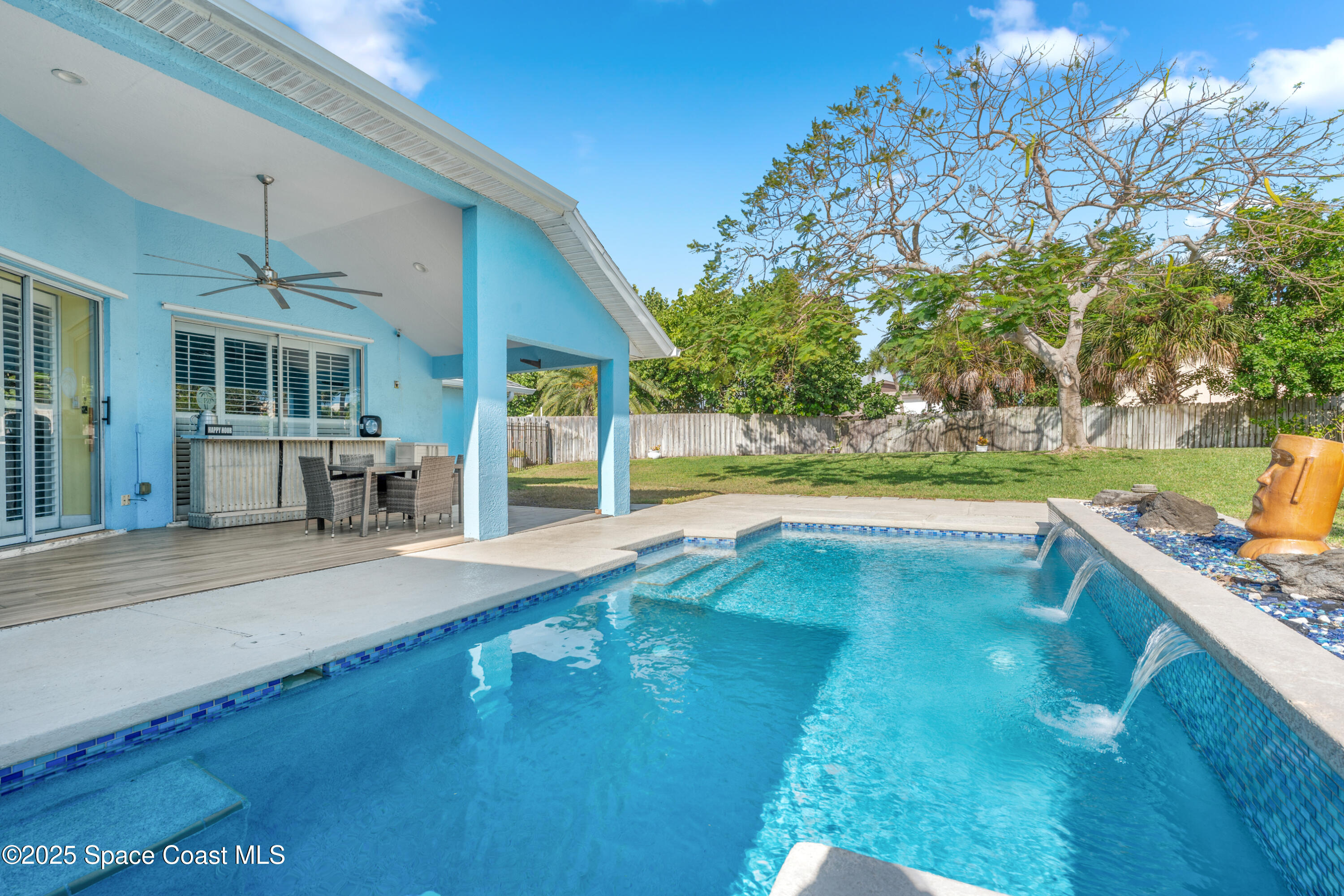 452 Veracruz Boulevard Indialantic, FL 32903 - Photo 28 of 42 a view of a house with a swimming pool