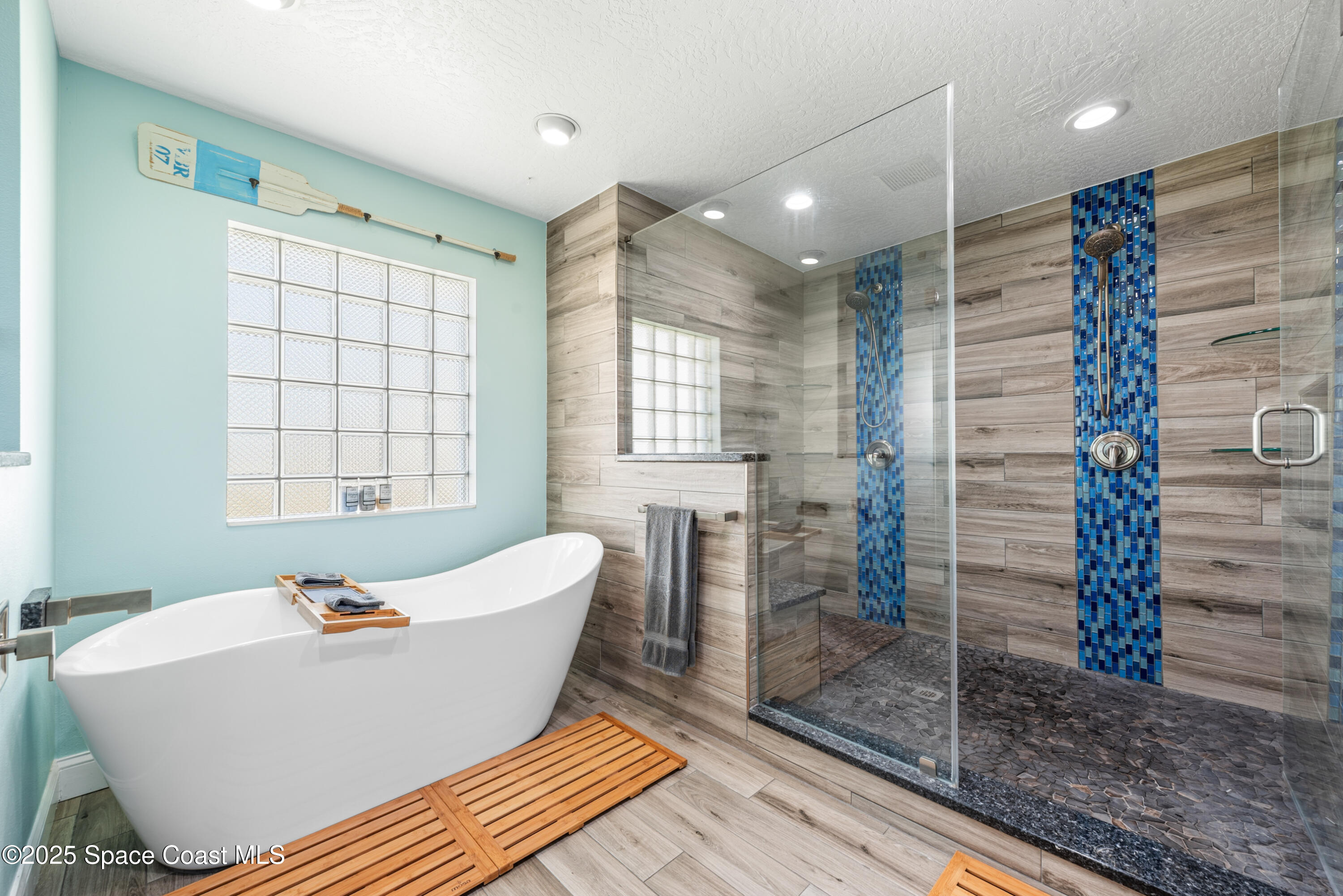 452 Veracruz Boulevard Indialantic, FL 32903 - Photo 8 of 42 a living room with furniture and a window