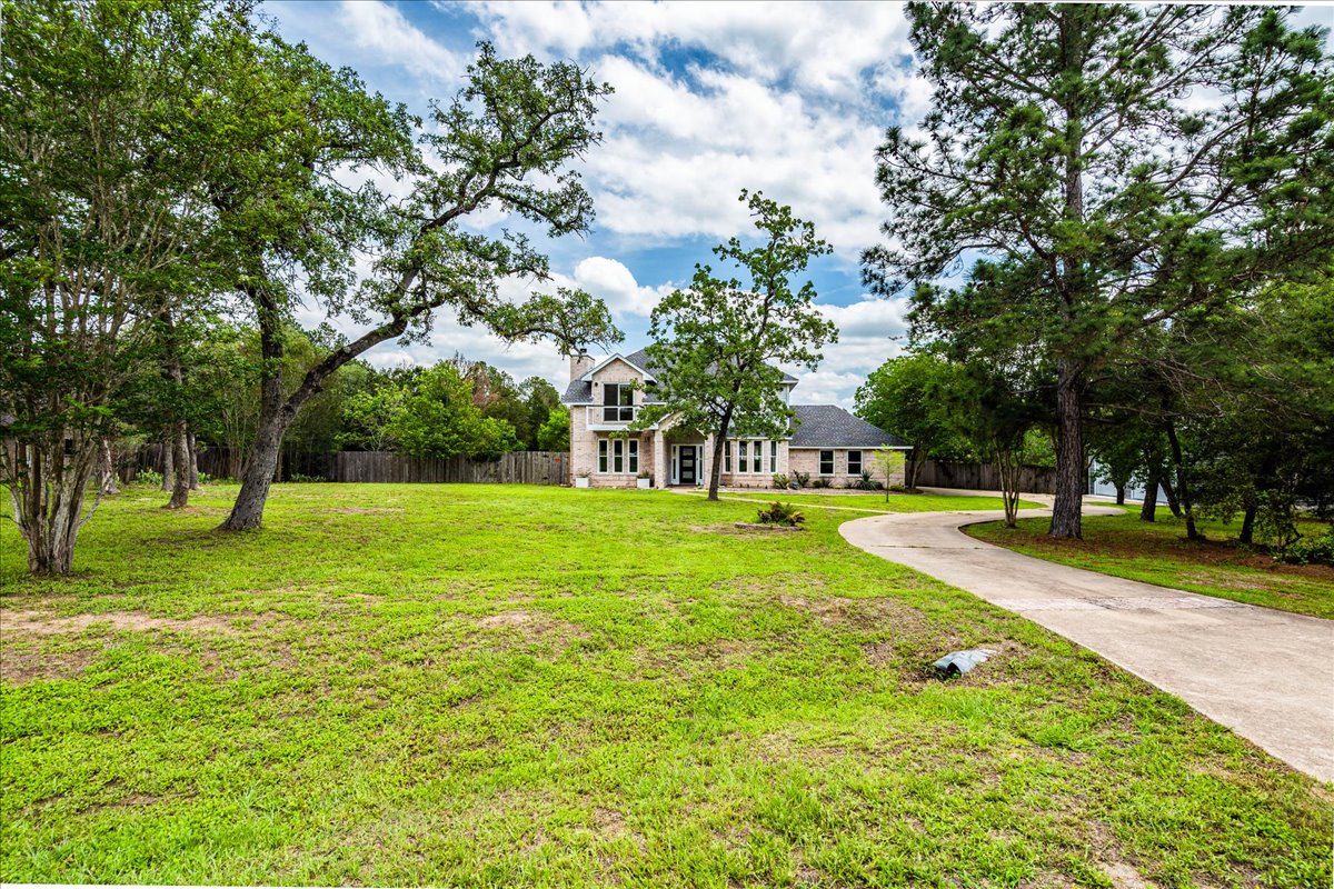 171 Pin Oak Crossing Elgin, TX 78621 - Photo 2 of 39 Large setback of the property ensures privacy