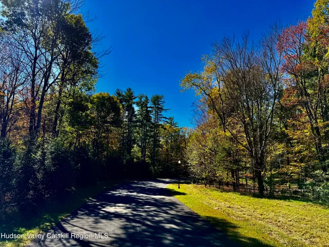 a view of a swimming pool with an outdoor space and seating area