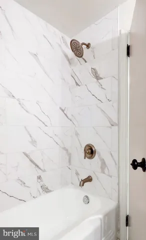 a bathroom with a bathtub