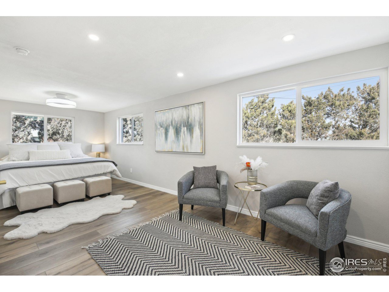 1310 Toedtli Drive Boulder, CO 80305 - Photo 16 of 40 a bedroom with furniture and a large window