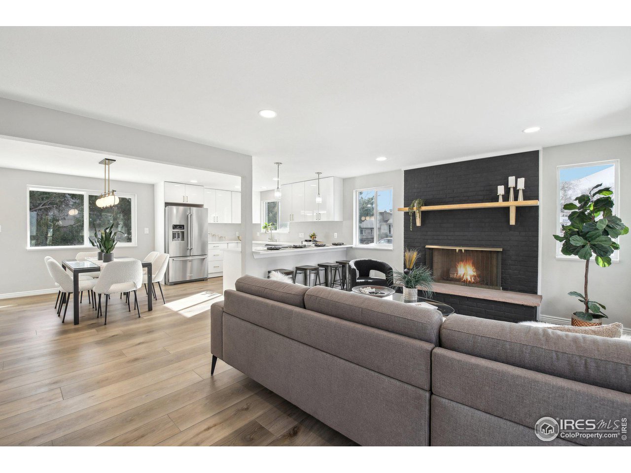 1310 Toedtli Drive Boulder, CO 80305 - Photo 40 of 40 a living room with furniture and a fireplace
