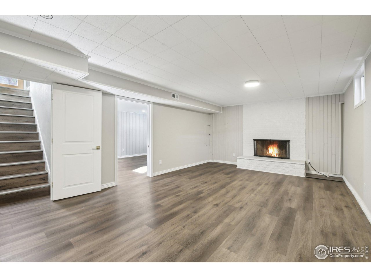 1310 Toedtli Drive Boulder, CO 80305 - Photo 20 of 40 a view of empty room with wooden floor