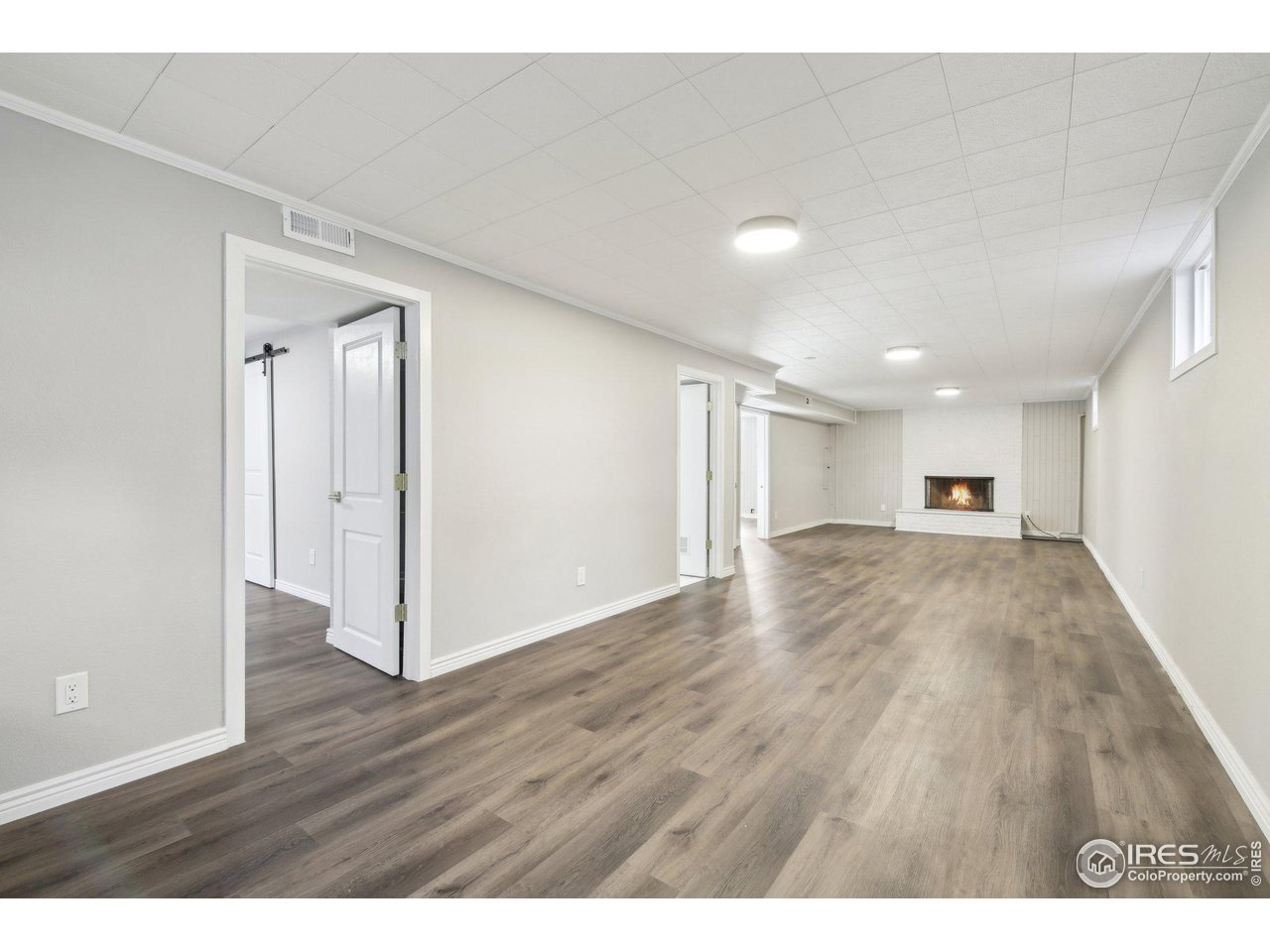 1310 Toedtli Drive Boulder, CO 80305 - Photo 22 of 40 a view of empty room with wooden floor