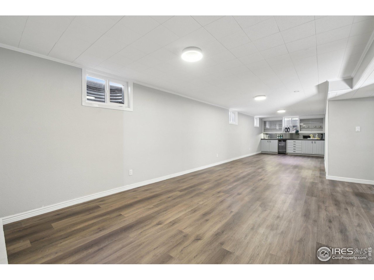 1310 Toedtli Drive Boulder, CO 80305 - Photo 23 of 40 a view of empty room with wooden floor