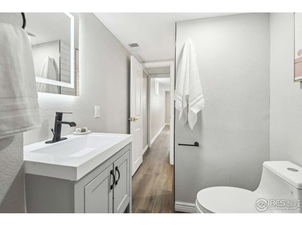 1310 Toedtli Drive Boulder, CO 80305 - Photo 24 of 40 a bathroom with a sink toilet and shower
