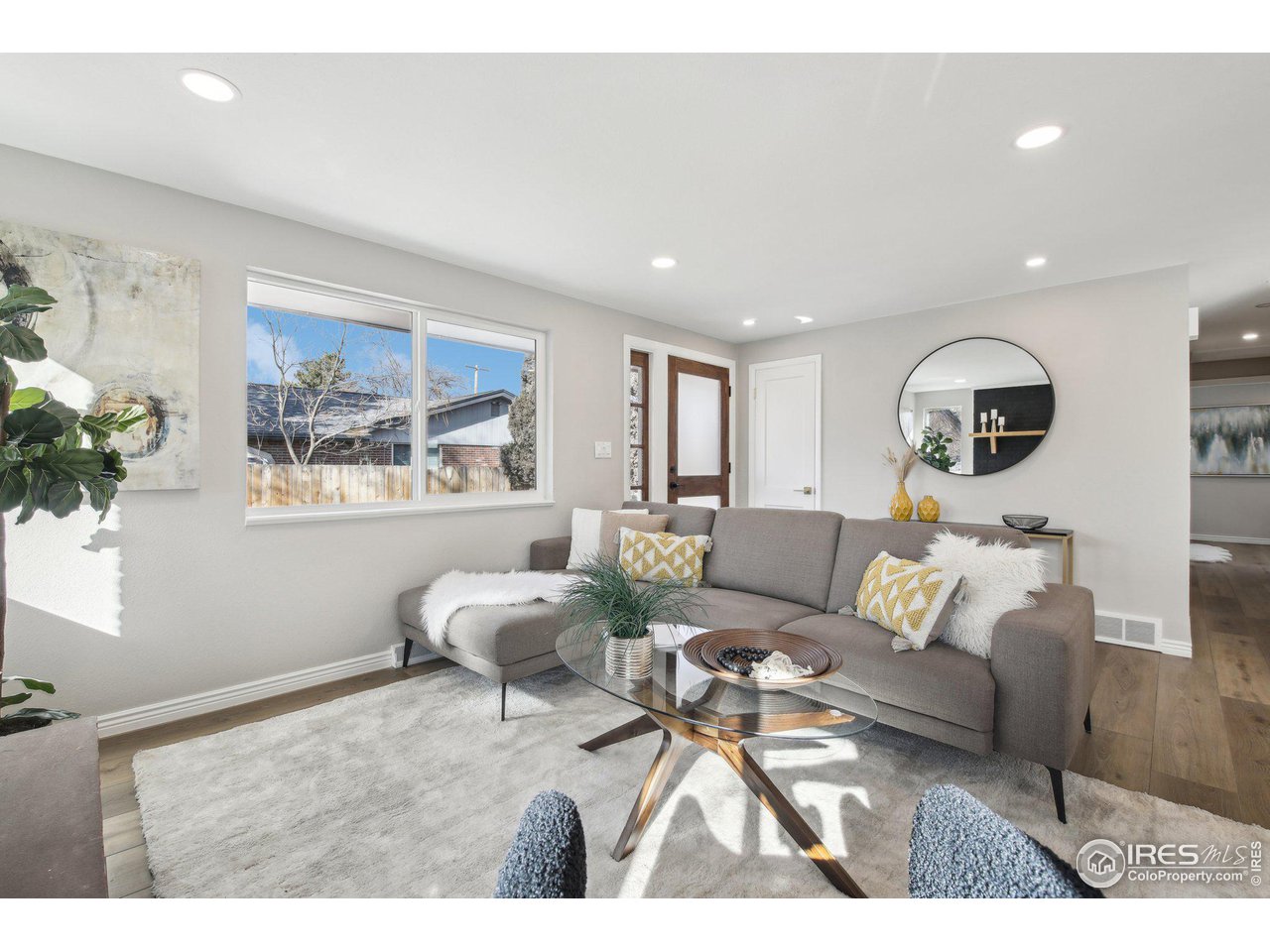1310 Toedtli Drive Boulder, CO 80305 - Photo 3 of 40 a living room with furniture and a large window