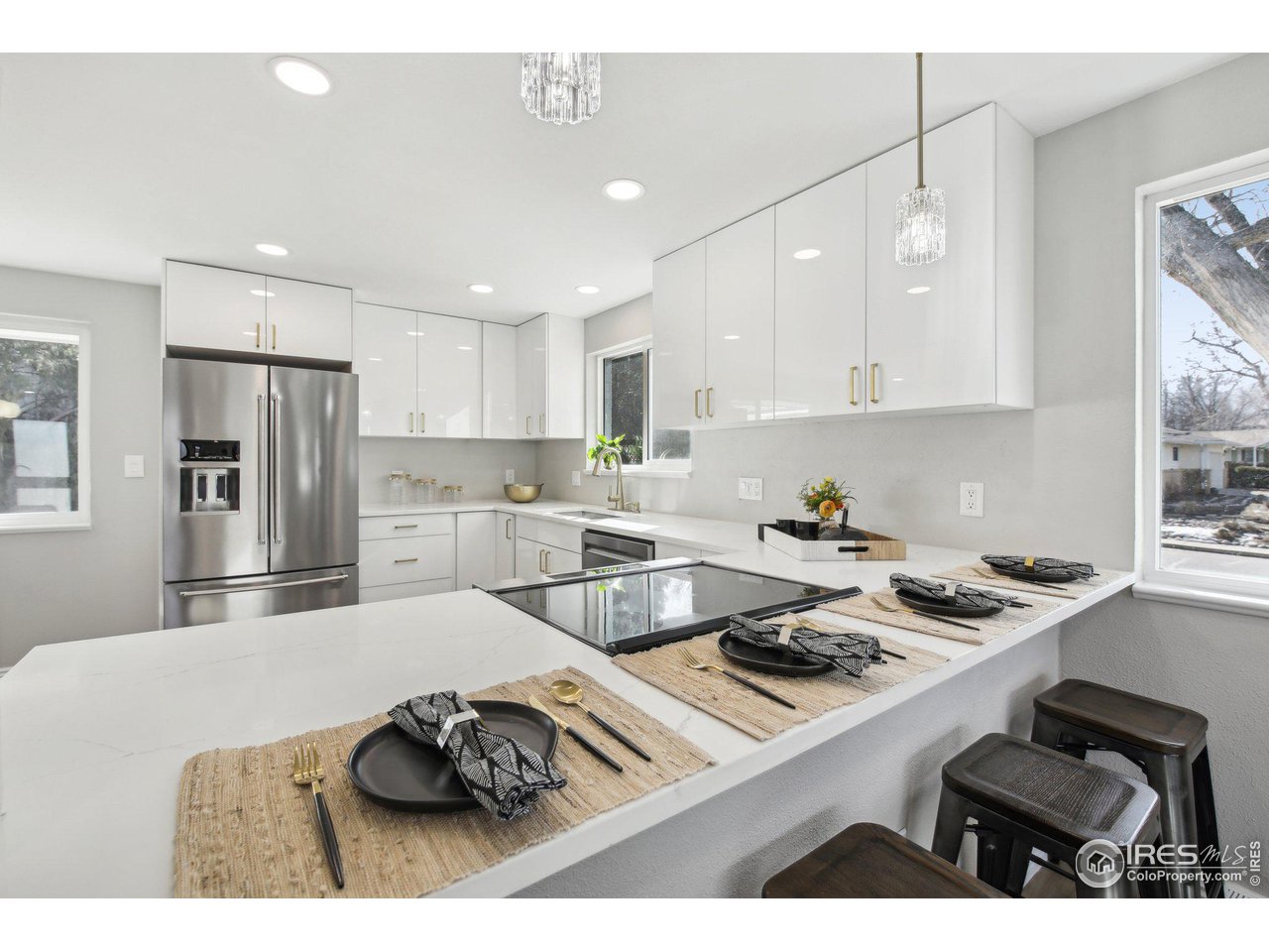 1310 Toedtli Drive Boulder, CO 80305 - Photo 5 of 40 a kitchen with a sink stove and refrigerator