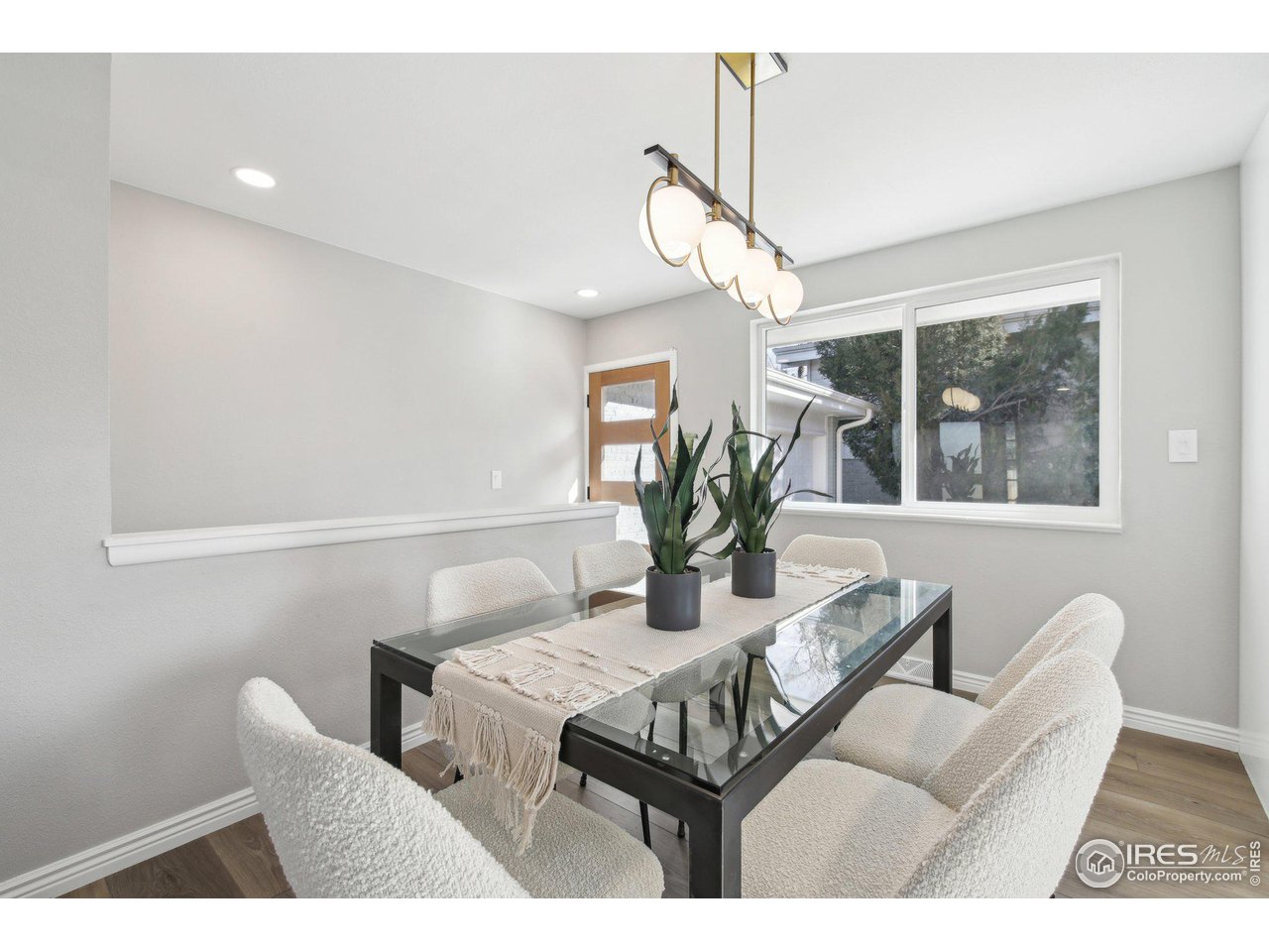 1310 Toedtli Drive Boulder, CO 80305 - Photo 9 of 40 a dining room with furniture and window