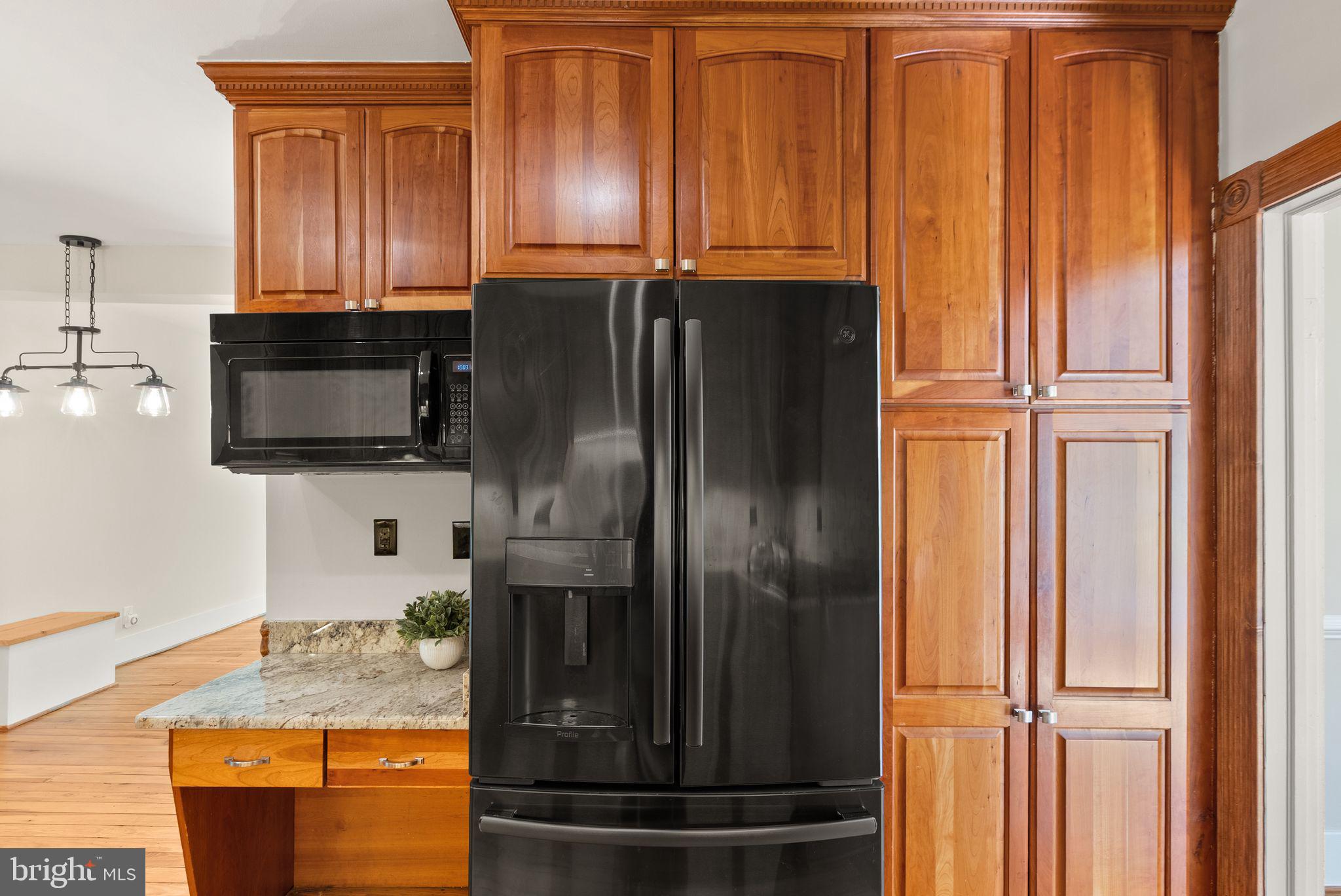 37151 Branchriver Road Purcellville, VA 20132 - Photo 23 of 63 a kitchen with stainless steel appliances granite countertop a refrigerator and a sink
