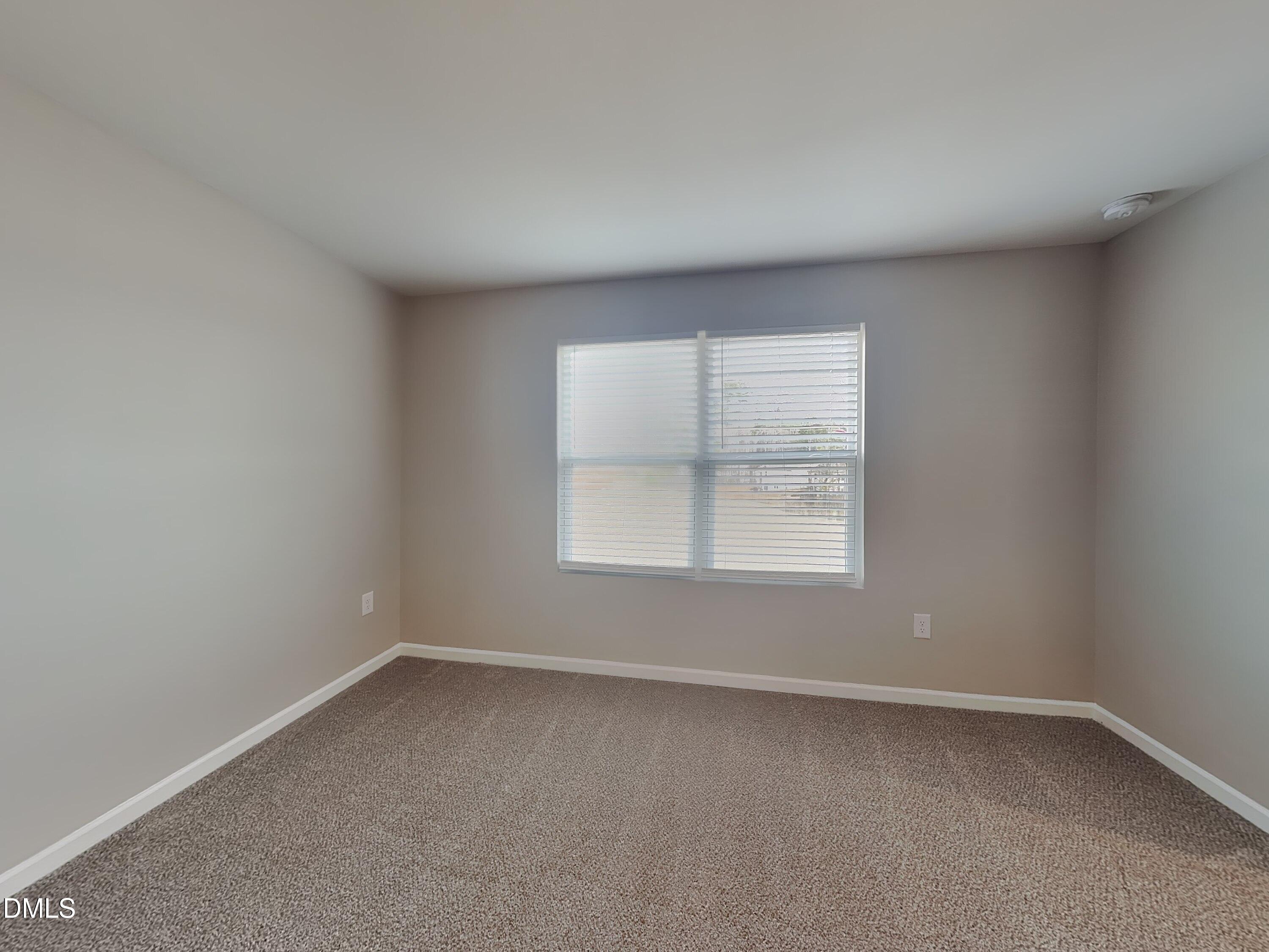 1416 Justice Union Court Raleigh, NC 27604 - Photo 6 of 16 an empty room with a window