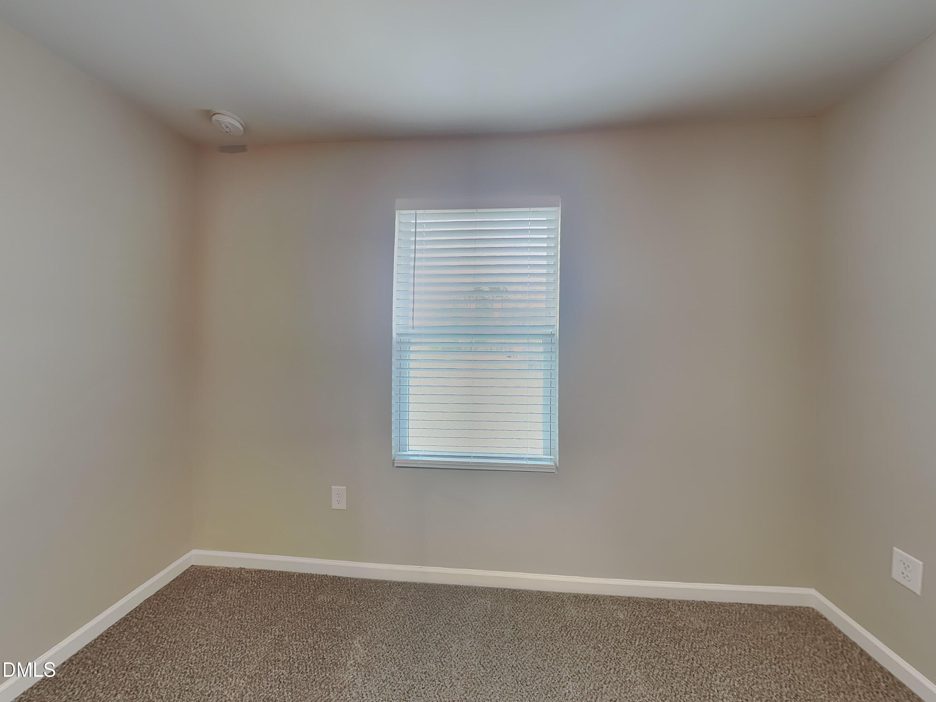 1416 Justice Union Court Raleigh, NC 27604 - Photo 9 of 16 an empty room with a window