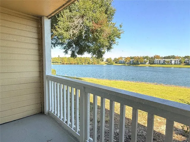 a view of balcony with furniture