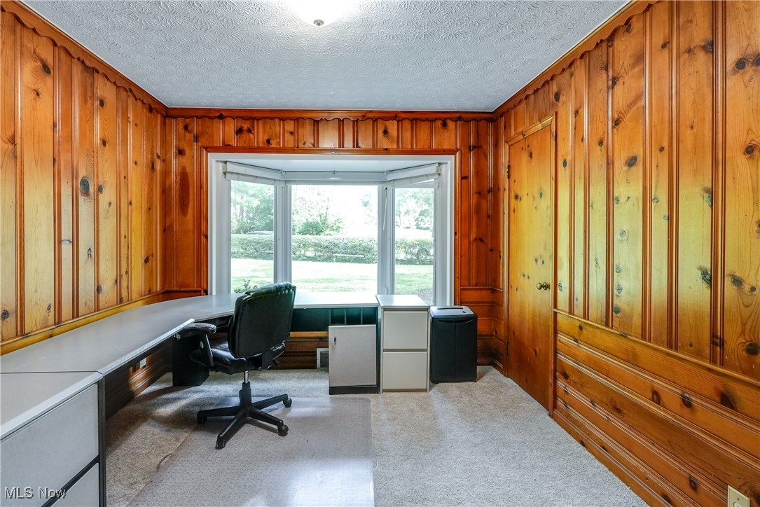 2488 Holgate Road Akron, OH 44313 - Photo 13 of 50 Bedroom 1 currently used as an office featuring a large bay window, great view, large closet, and built in shelving.