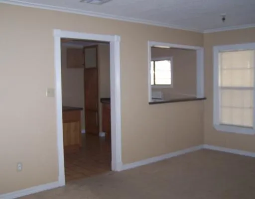 an empty room that has a window