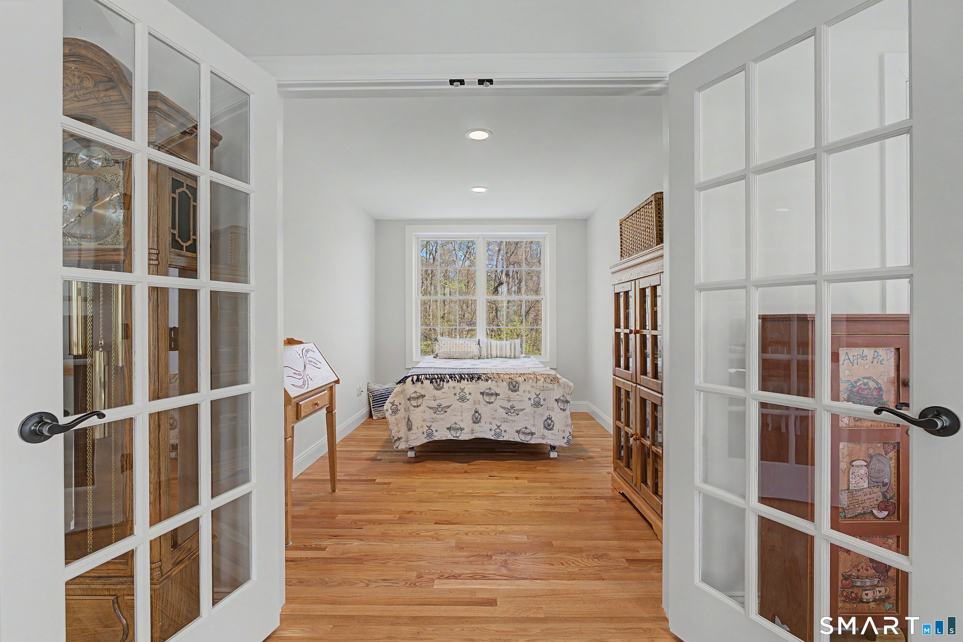 211 Meadowbrook Road, Unit 211 Oxford, CT 06478 - Photo 28 of 38 A versatile second-level bonus room behind elegant French doors-perfectly suited for a private home office, creative studio, or peaceful retreat.