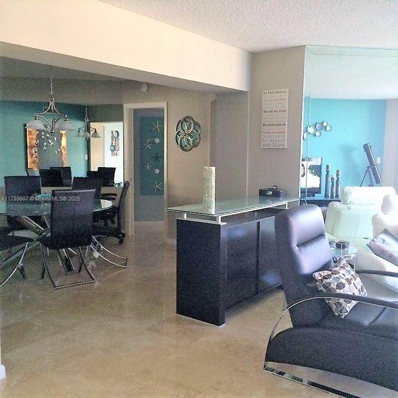 1340 South Ocean Boulevard, Unit 1003 Pompano Beach, FL 33062 - Photo 15 of 27 a living room with furniture