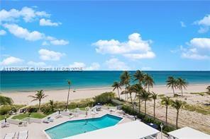 1340 South Ocean Boulevard, Unit 1003 Pompano Beach, FL 33062 - Photo 26 of 27 a view of a lake and front yard