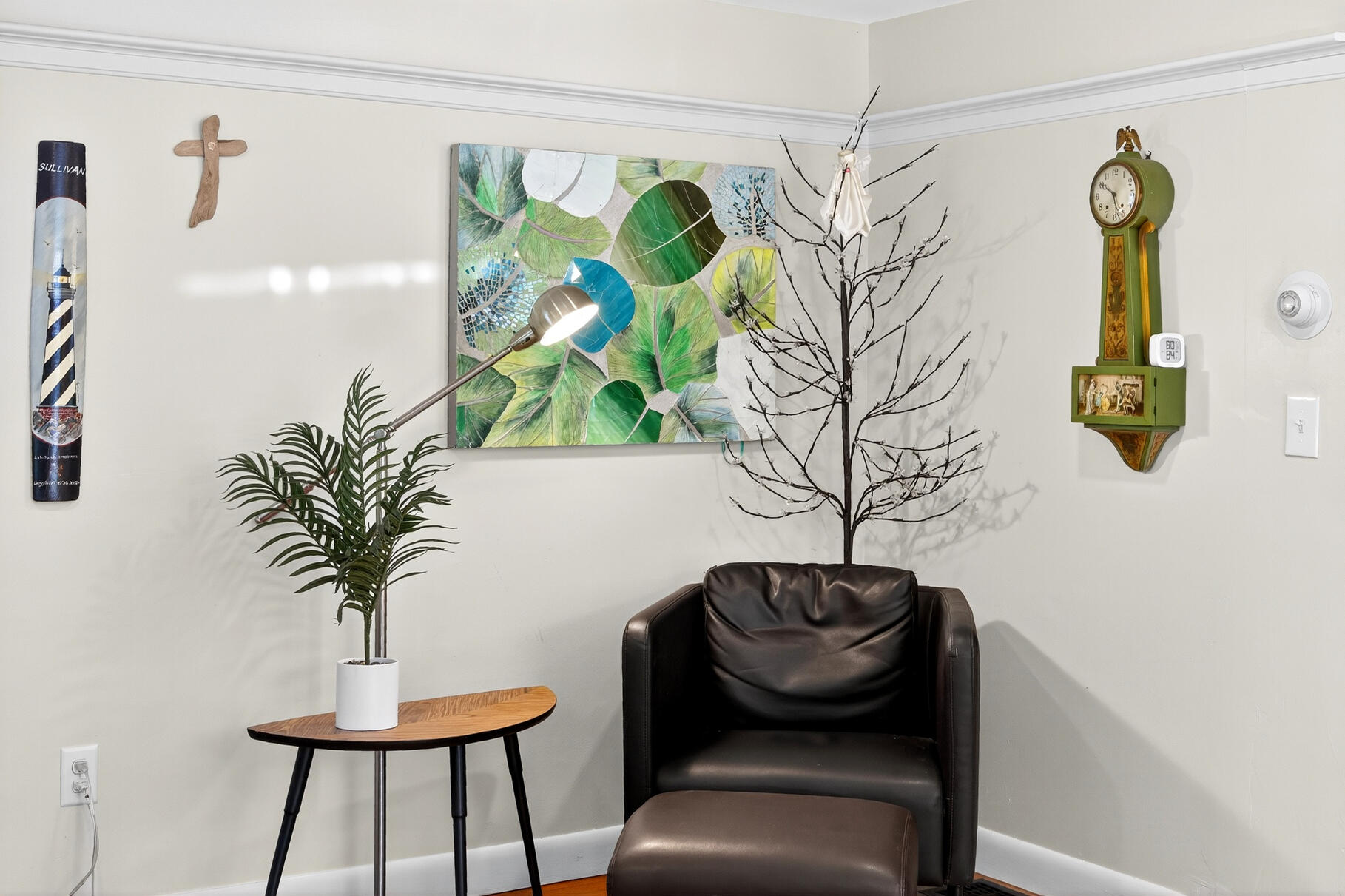 18 Seaview Road Sagamore Beach, MA 02562 - Photo 13 of 62 a view of a flower pot with a small table and a potted plant