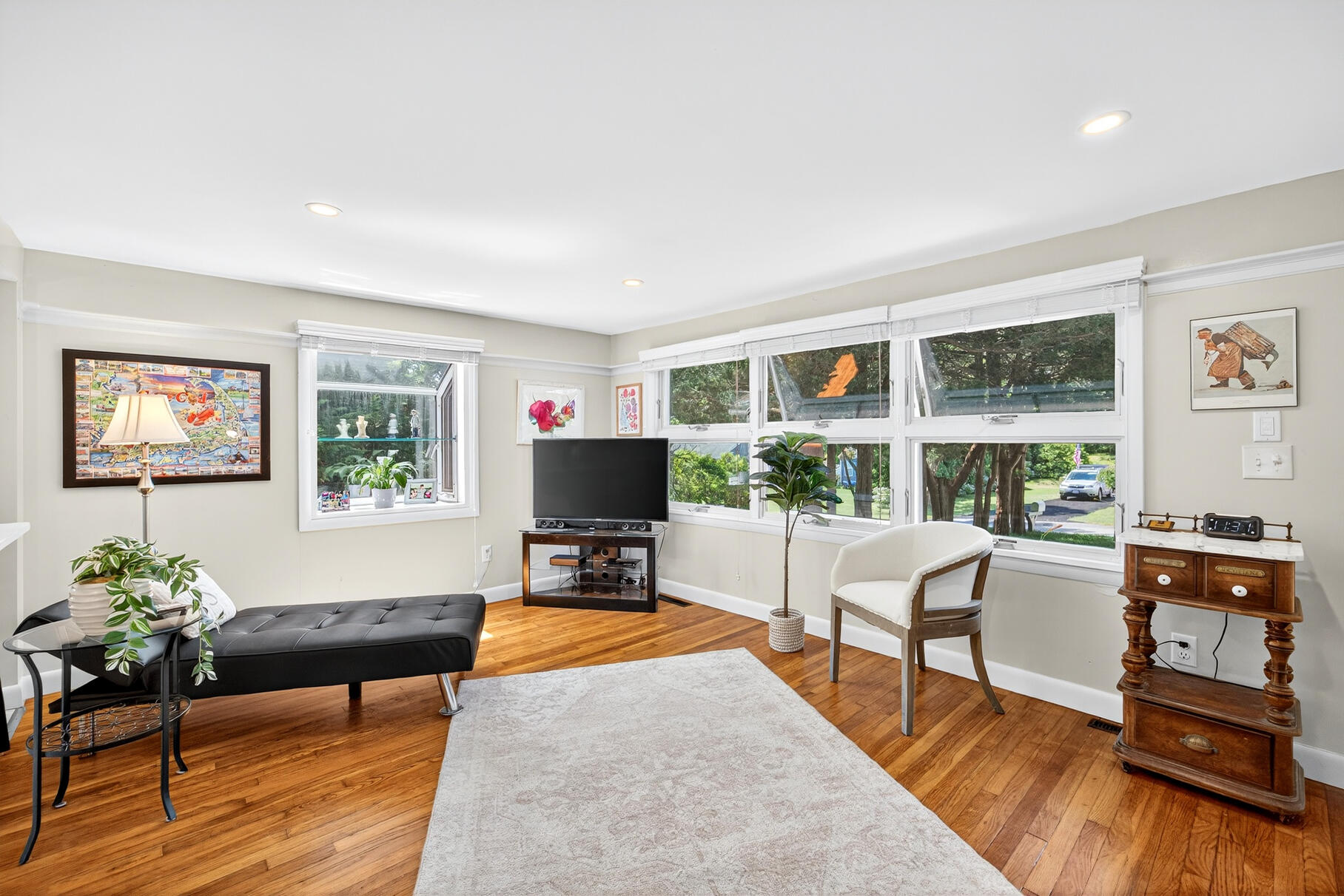 18 Seaview Road Sagamore Beach, MA 02562 - Photo 15 of 62 a living room with furniture a large window and wooden floor
