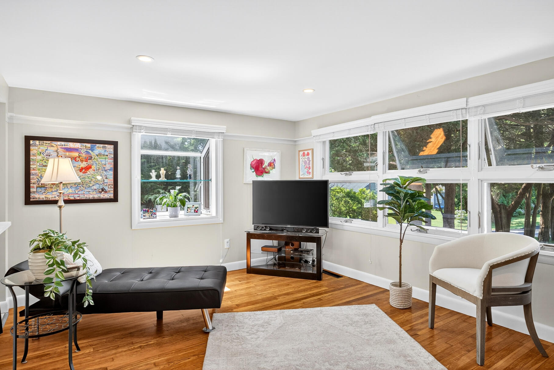 18 Seaview Road Sagamore Beach, MA 02562 - Photo 16 of 62 a living room with furniture and a flat screen tv