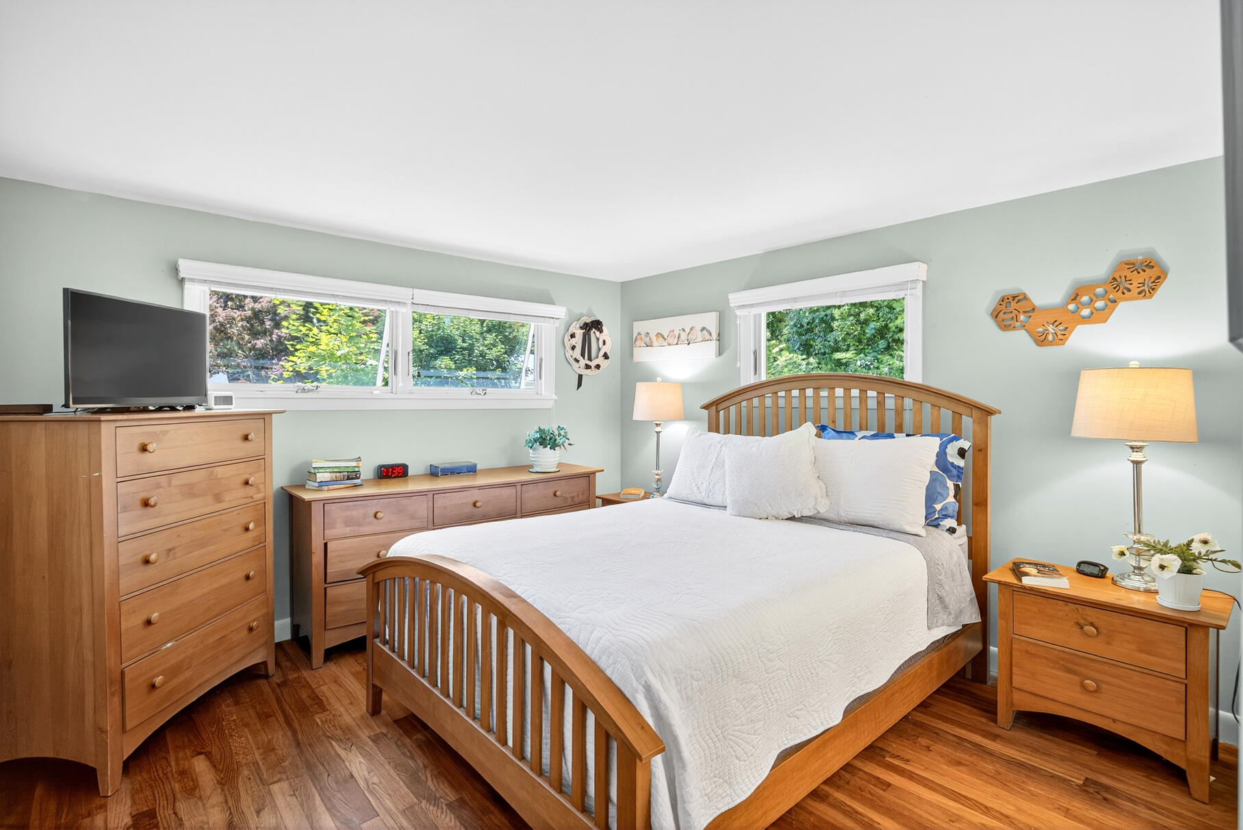 18 Seaview Road Sagamore Beach, MA 02562 - Photo 28 of 62 a bedroom with a bed and a flat tv screen on dresser