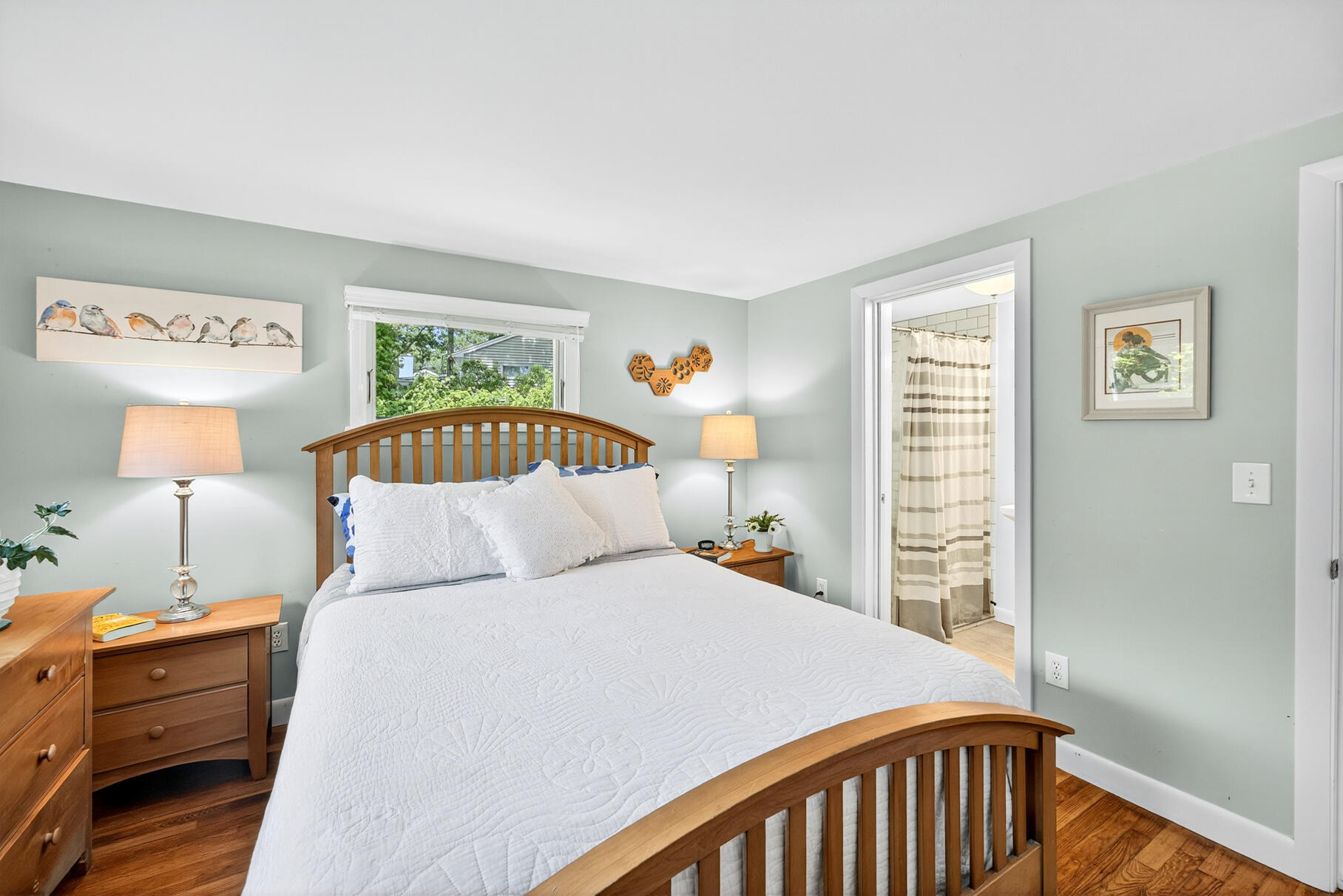 18 Seaview Road Sagamore Beach, MA 02562 - Photo 30 of 62 a bedroom with a bed and a lamp on dresser
