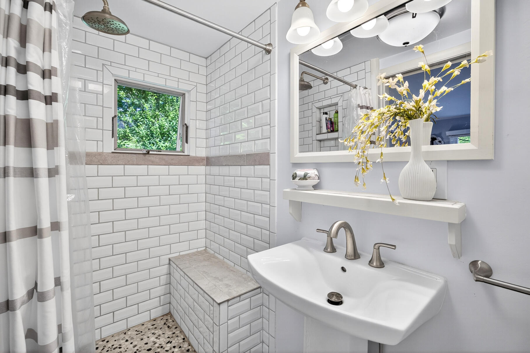 18 Seaview Road Sagamore Beach, MA 02562 - Photo 33 of 62 a bathroom with a sink a vanity and a mirror