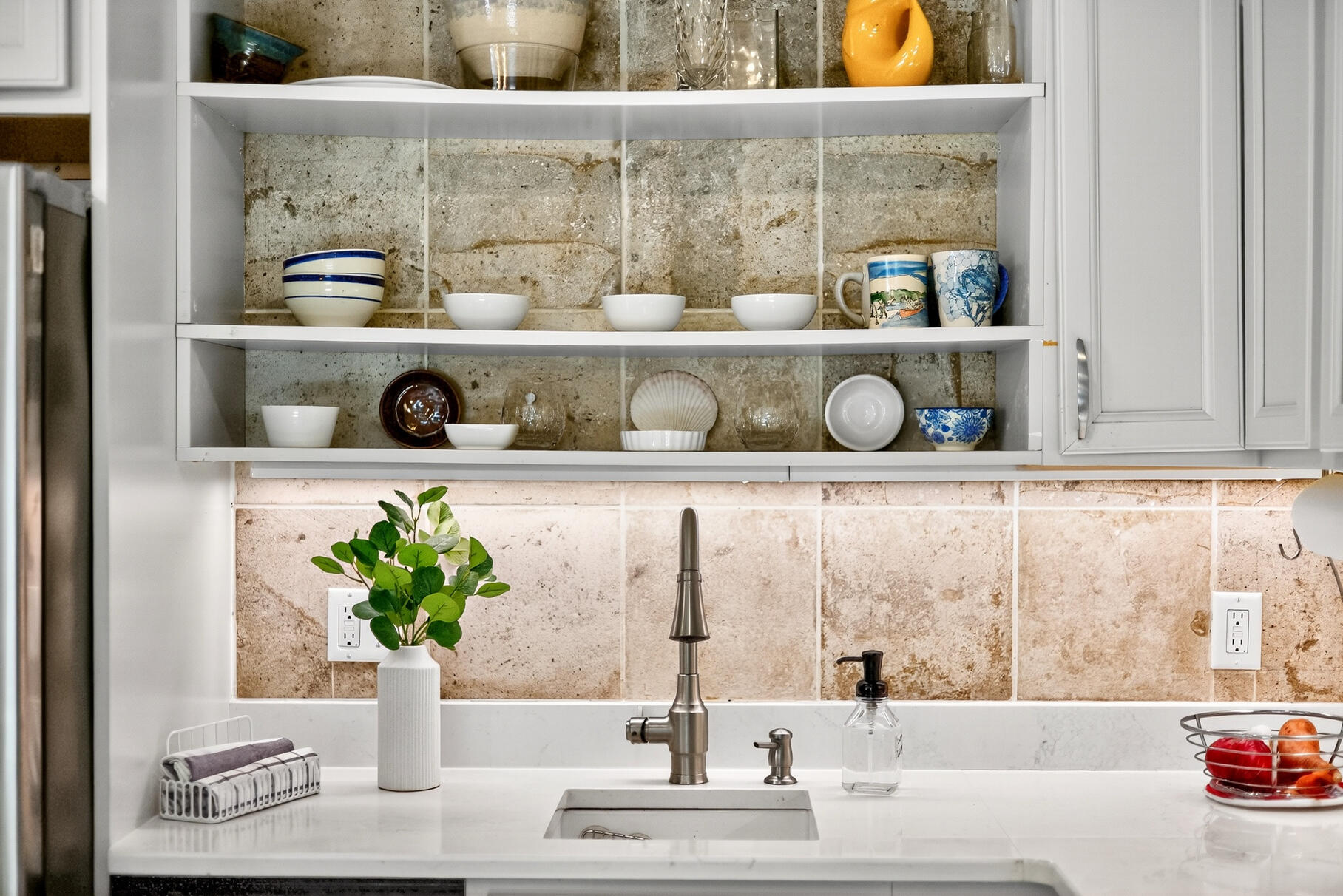 18 Seaview Road Sagamore Beach, MA 02562 - Photo 38 of 62 a vase of flowers sitting on a shelf