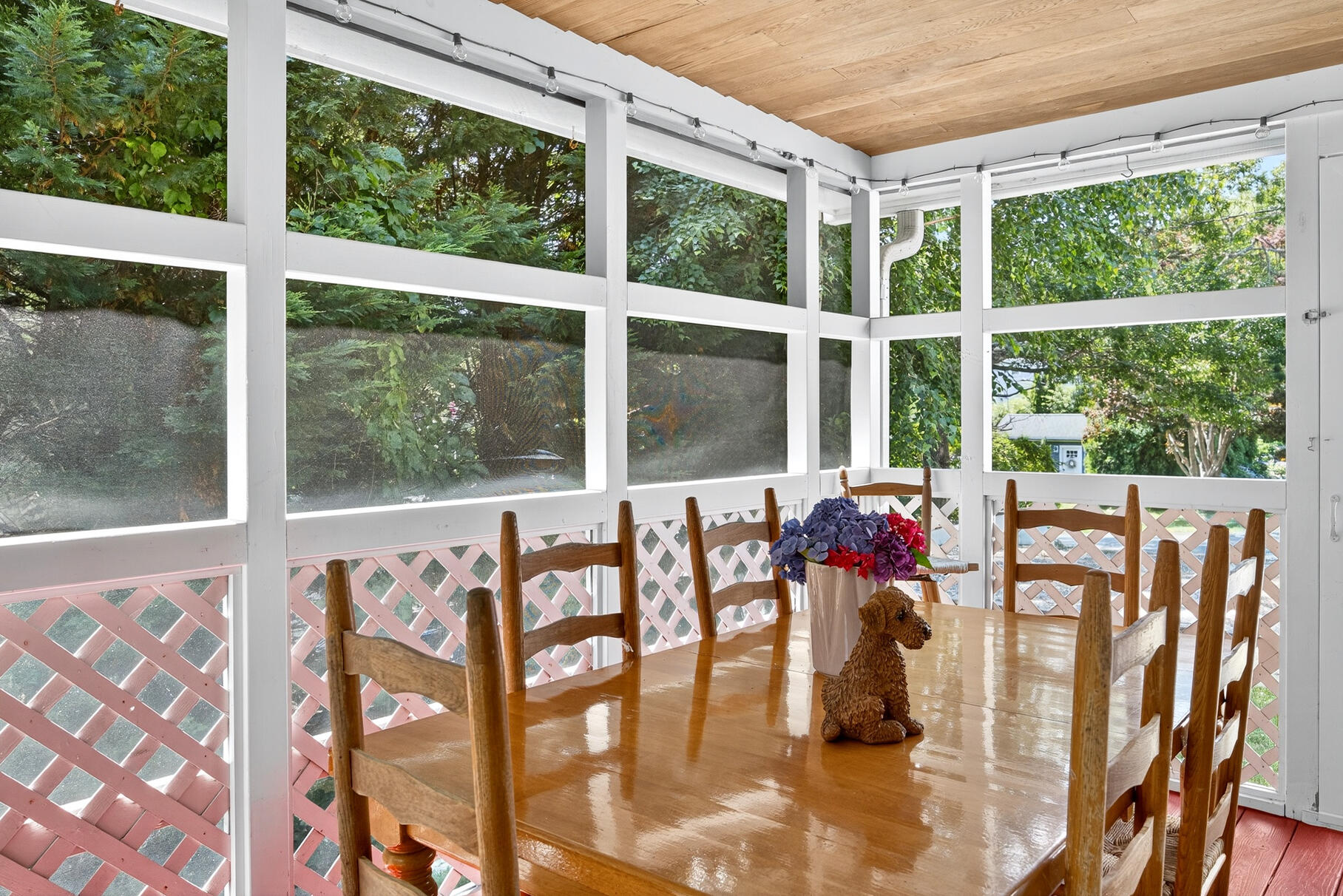 18 Seaview Road Sagamore Beach, MA 02562 - Photo 45 of 62 a view of a dining area with furniture and floor to ceiling windows